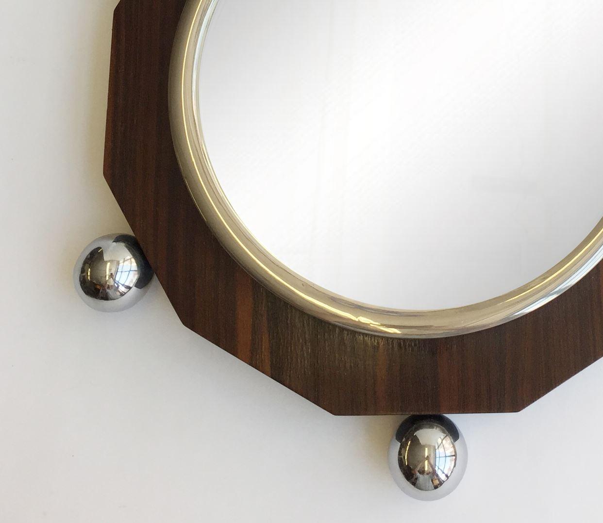 Wooden hexagonal nautical mirror made from acacia wood and 6 nickel platted spheres. 

Property from esteemed interior designer Juan Montoya. Juan Montoya is one of the most acclaimed and prolific interior designers in the world today. Juan