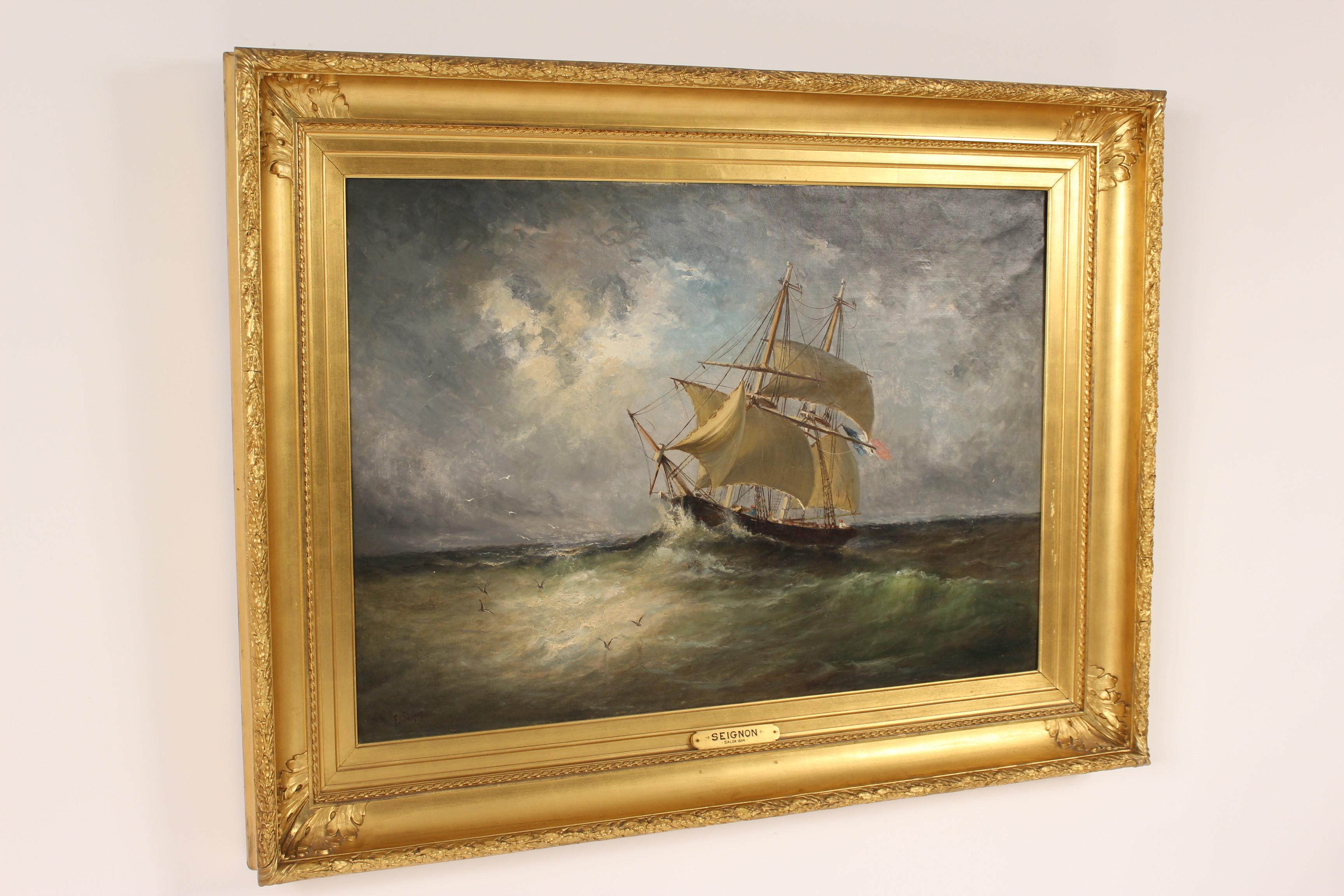 Nautical painting of a sailboat in choppy seas by French artist Paul Seignon (1820-1890), signed lower left corner. With original gold leaf frame. Oil on canvas. Frame dimensions: Height 37.75