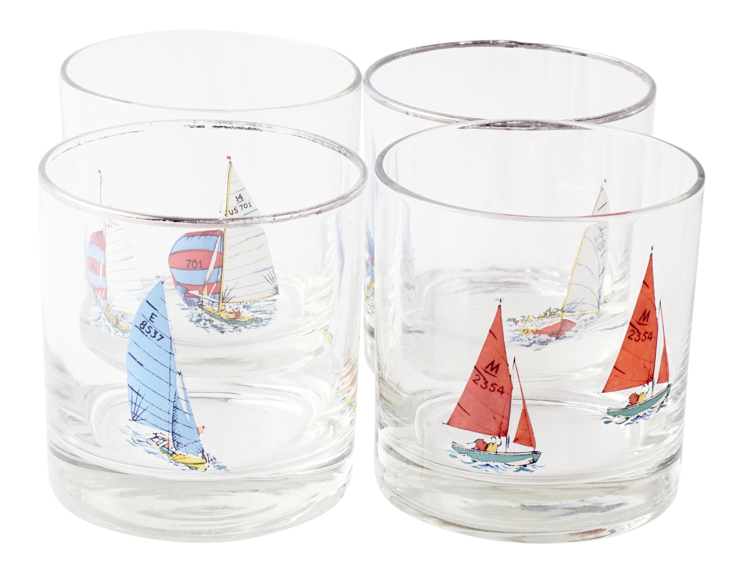 Nautical rocks glasses with silver rim, circa 1960s.
