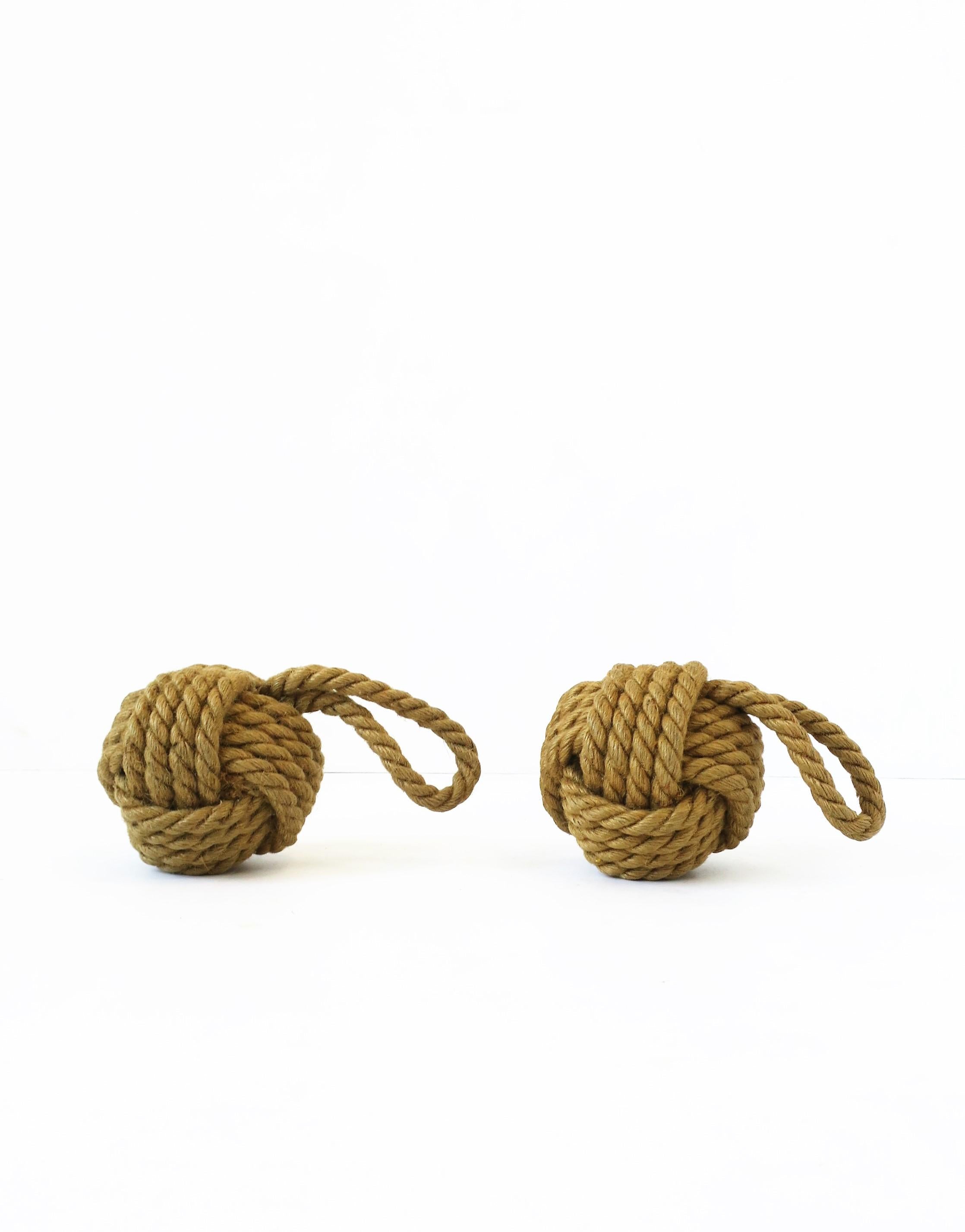 Small nautical rope knot decorative object. One (1) available now, as per listing. Measurements: 4.25