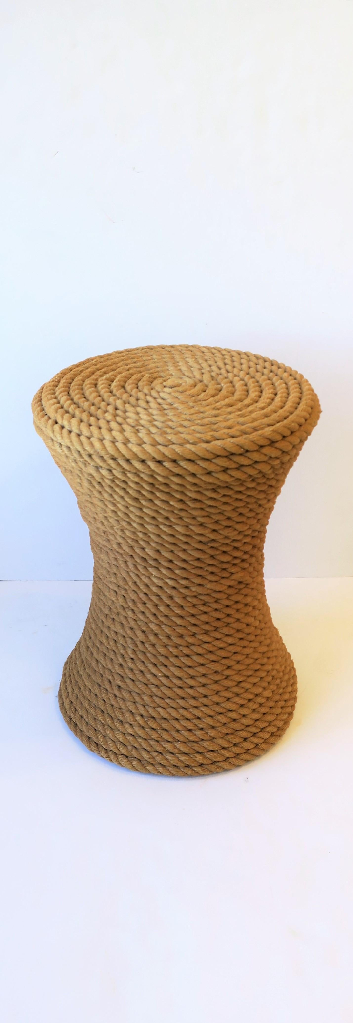 A great round French rope style or nautical rope end, side or drinks table with hourglass design. Dimensions: 15.5
