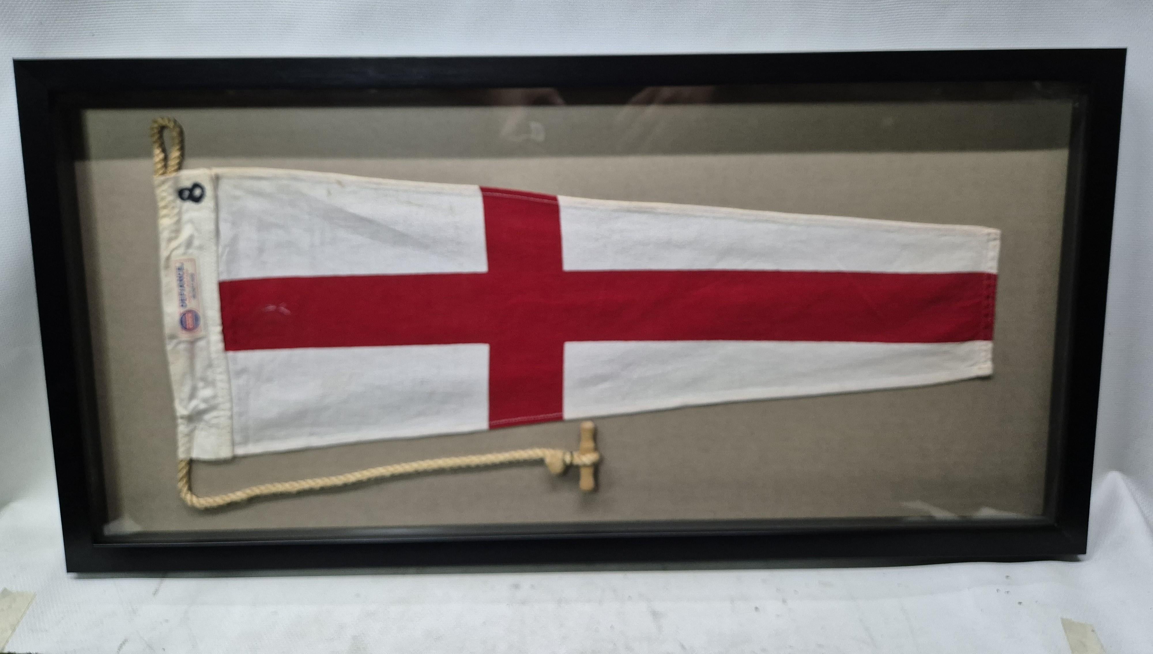 Genuine international maritime signal flag in a custom shadowbox frame. The cotton flag represents numeral 