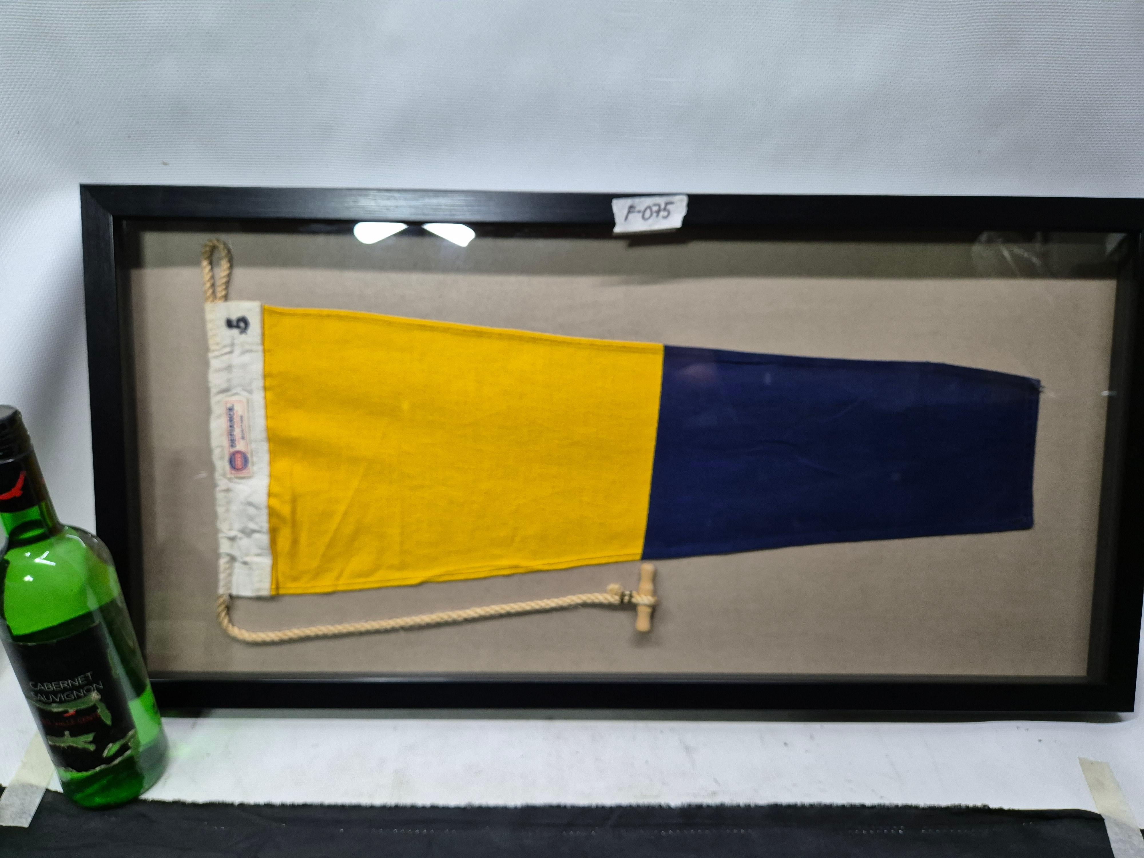 Genuine international maritime signal flag in a custom shadowbox frame. The cotton flag represents numeral 