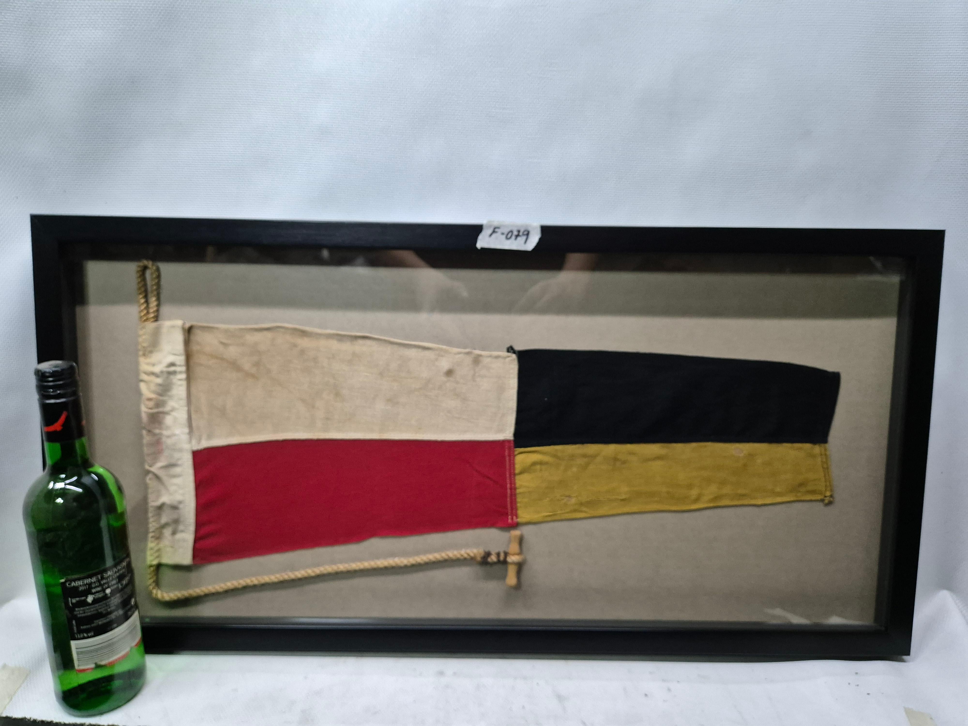 Genuine international maritime signal flag in a custom shadowbox frame. The cotton flag represents numeral 