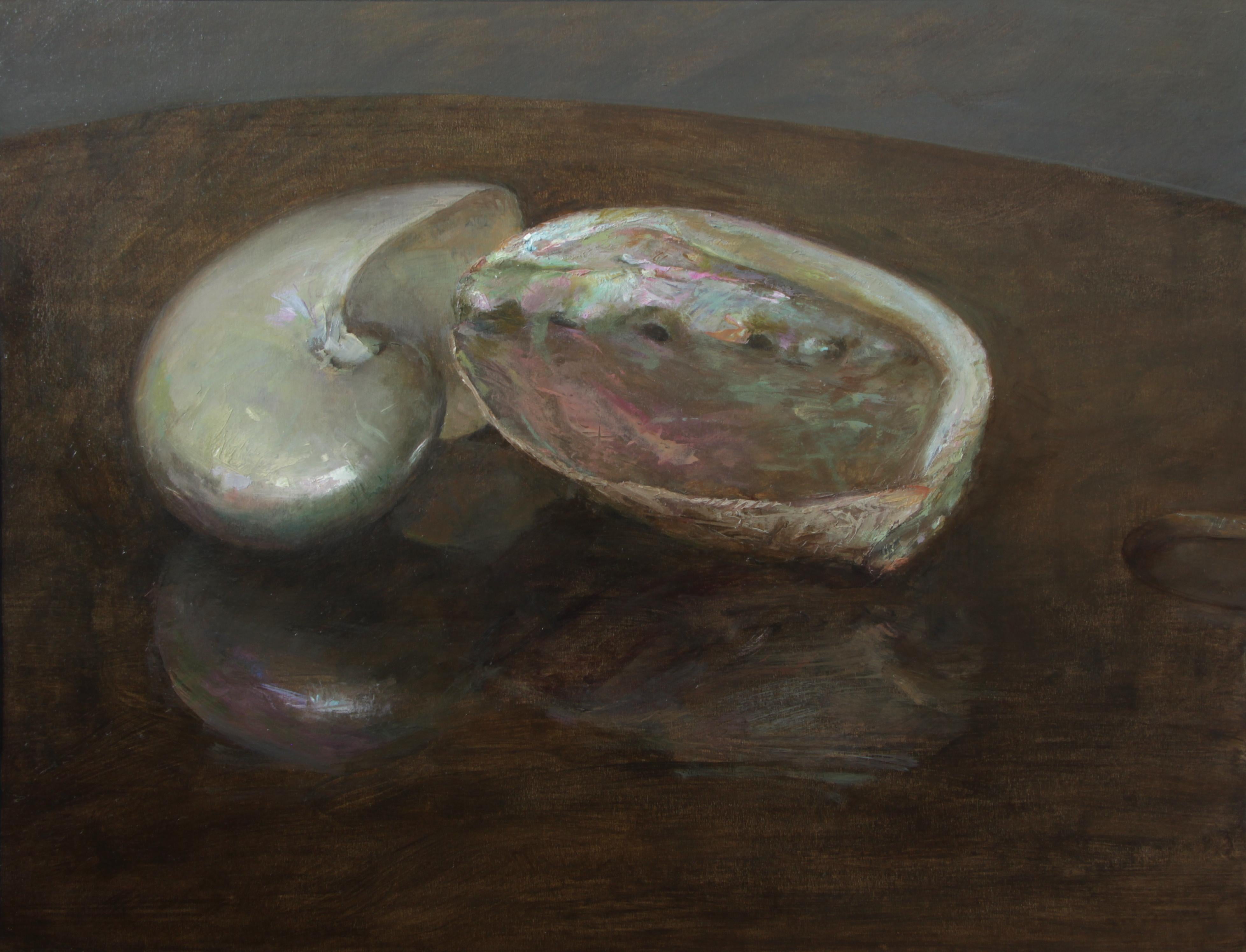 The two shells, a nautilus and an abalone, are beautiful in their simplicity in this still life by Helen Oh. The rich hues of the shell's mother of pearl surfaces are reflected on the deep dense color of the table on which they are placed. The two