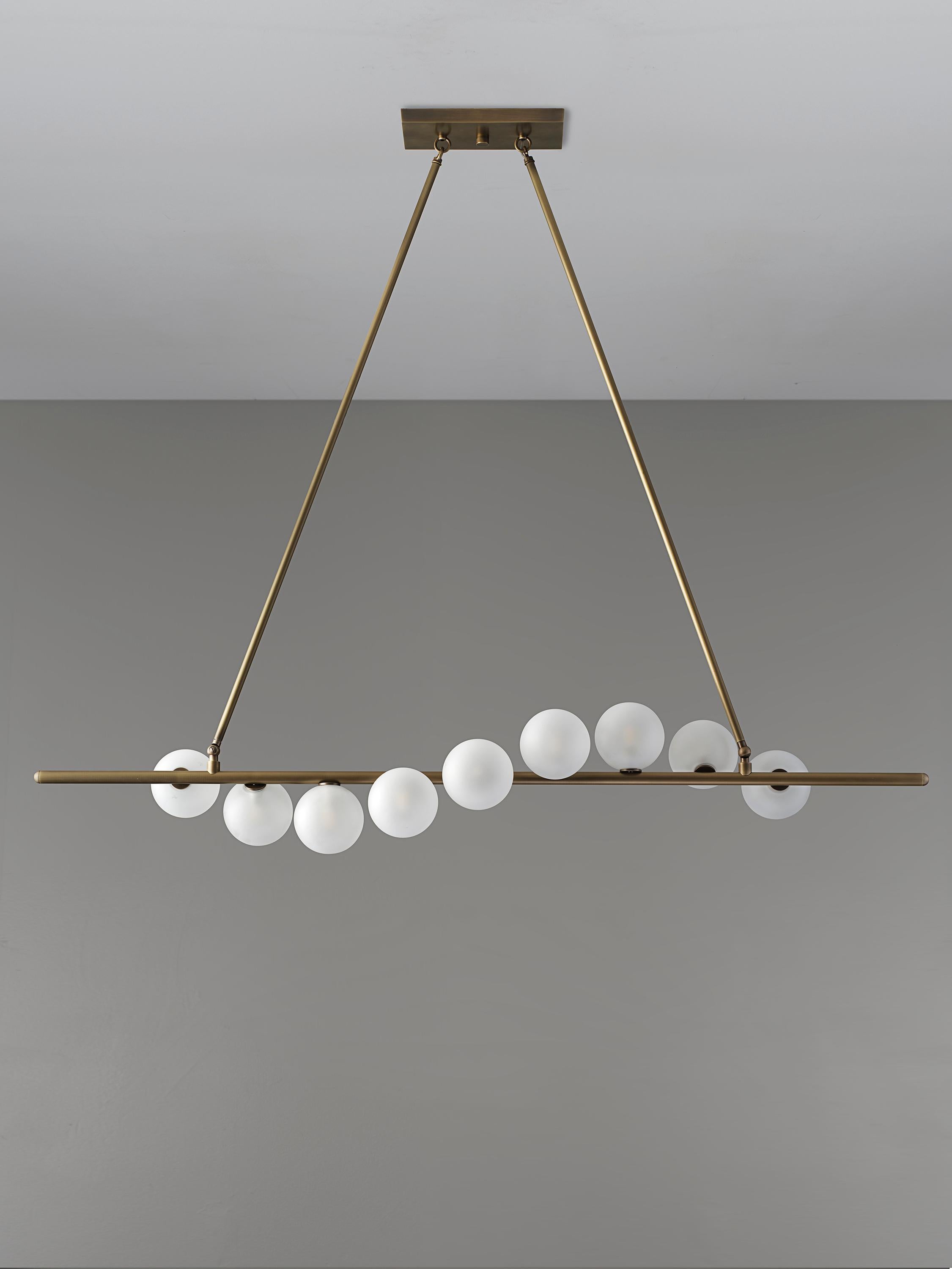 NAUTILUS chandelier by Blueprint Lighting is an elegant piece of functional sculpture that emits a stunning candlelit glow. Featuring gracefully spiraling satin glass globes, Nautilus is an elegantly striking centerpiece. Gorgeous from any