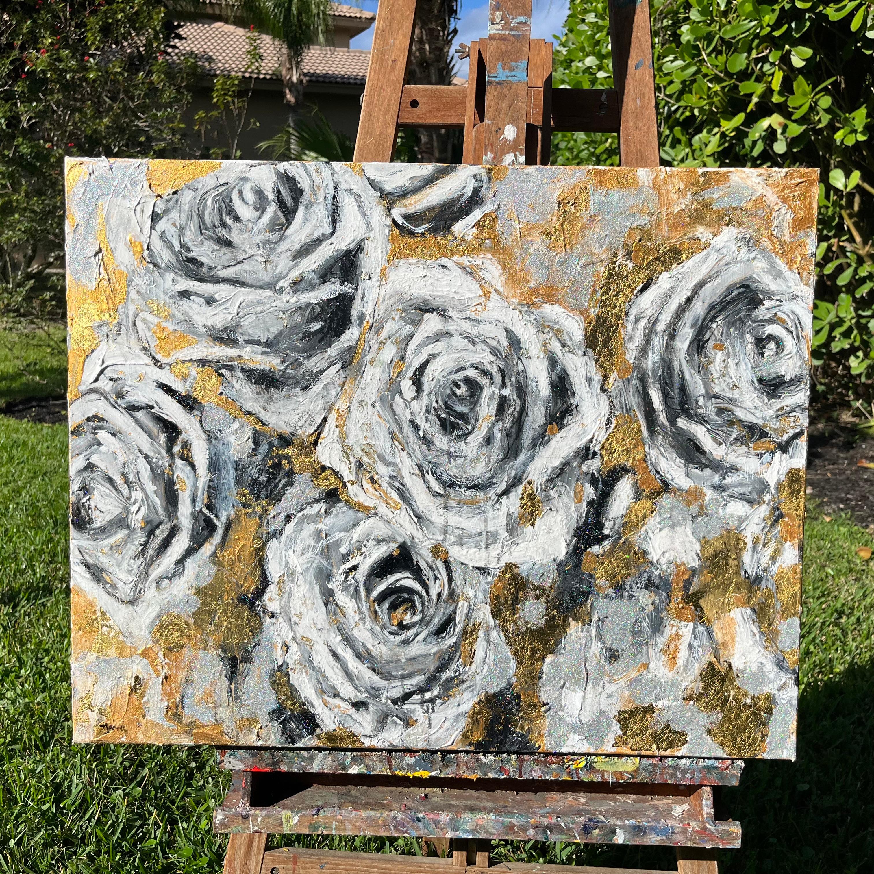 <p>Artist Comments<br>Black and white rose petals unfurl amid splashes of gold in this acrylic and oil painting. Each stroke captures emotion, holding moments in the eternal beauty of the flowers. The artwork exudes a symphony that whispers tales of