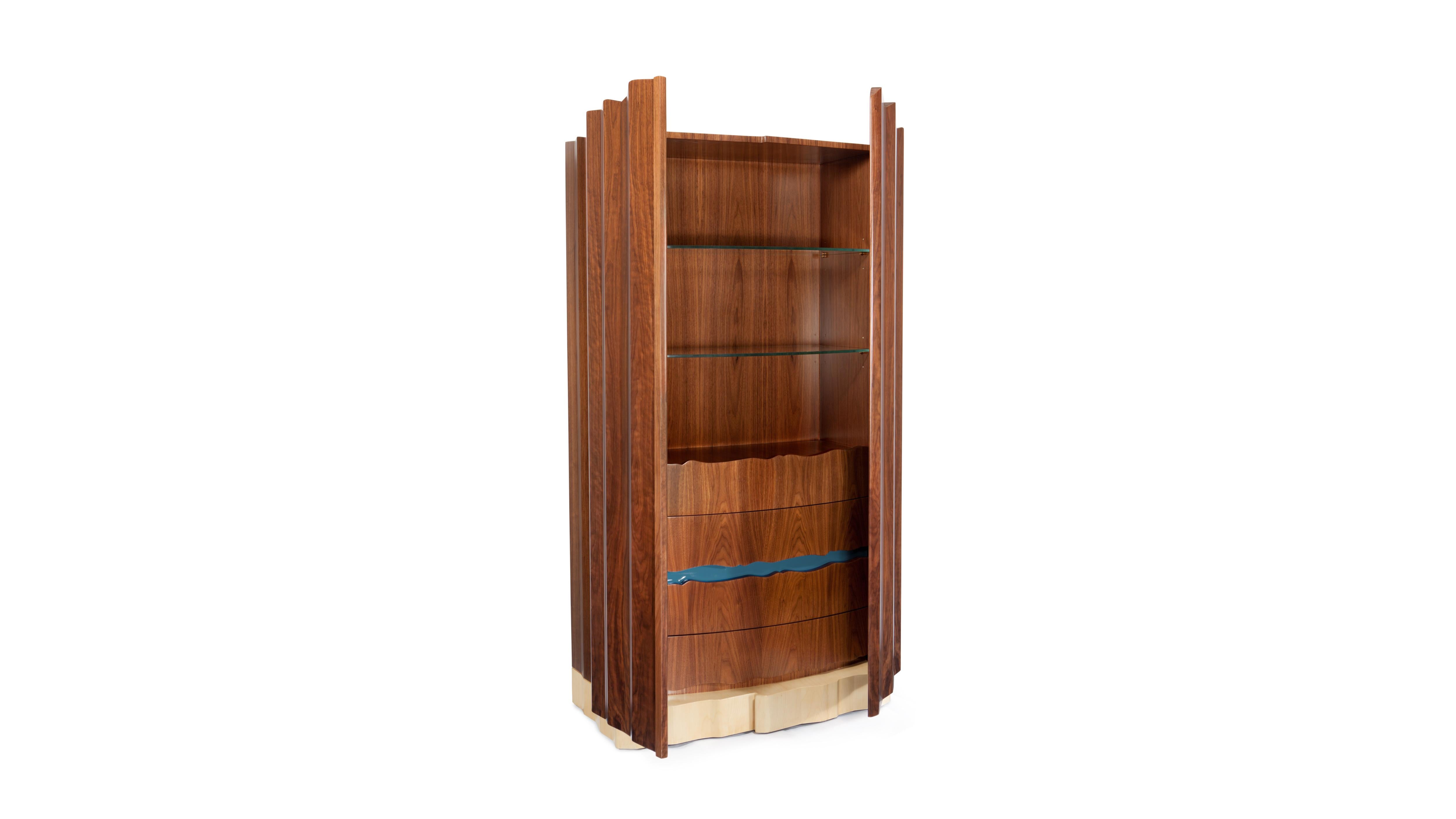Navajo Canyon Cabinet by InsidherLand
Dimensions: D 54 x W 100 x H 200 cm.
Materials: 
Wooden structure: walnut and sycamore veneers. Drawers: opening detail and interior lacquered in Ref. Colorado Blue. Shelves: glass.
120 kg.

The cabinet Navajo