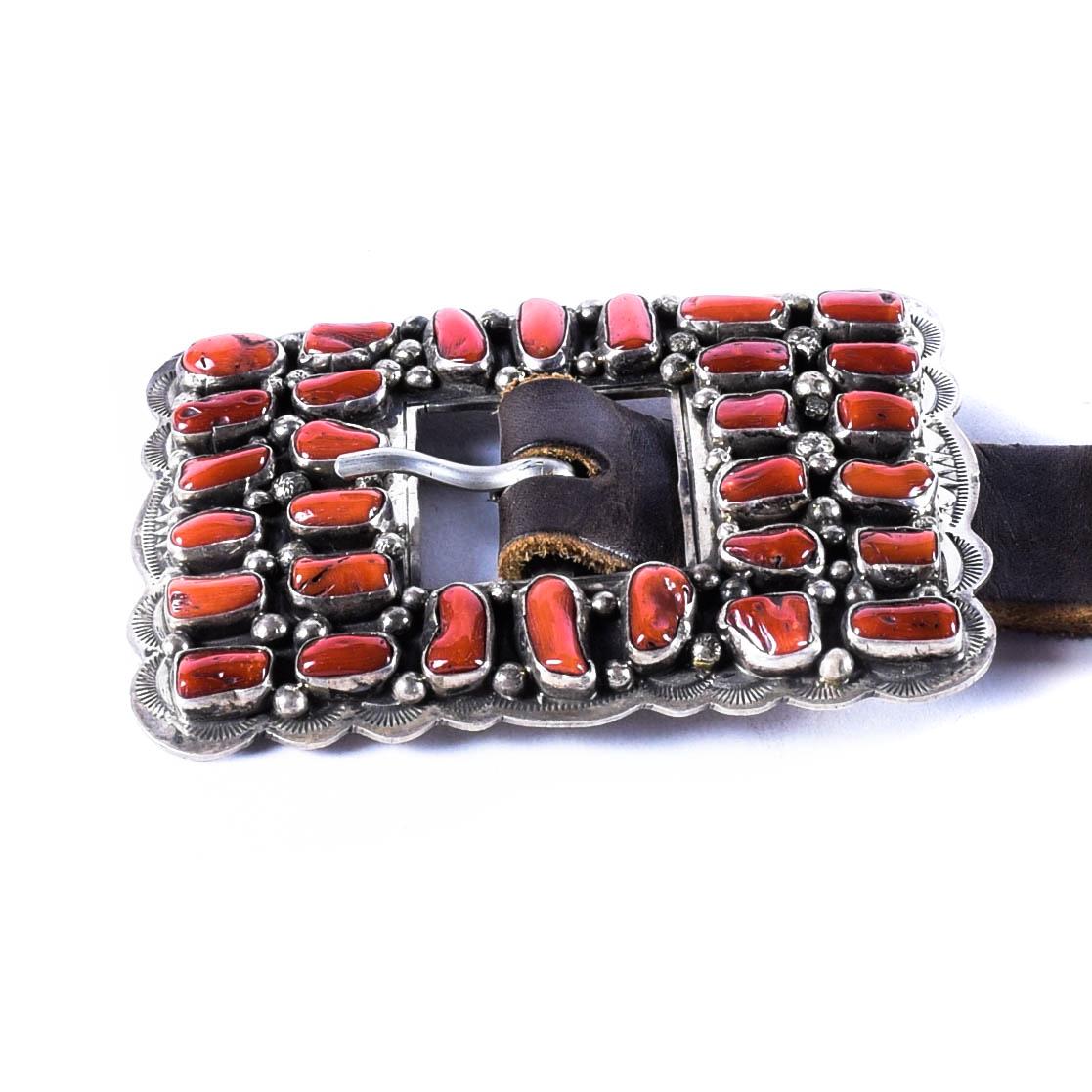 Excellent quality Navajo coral concho belt, with high grade coral conchos; marked sterling silver. Signed 