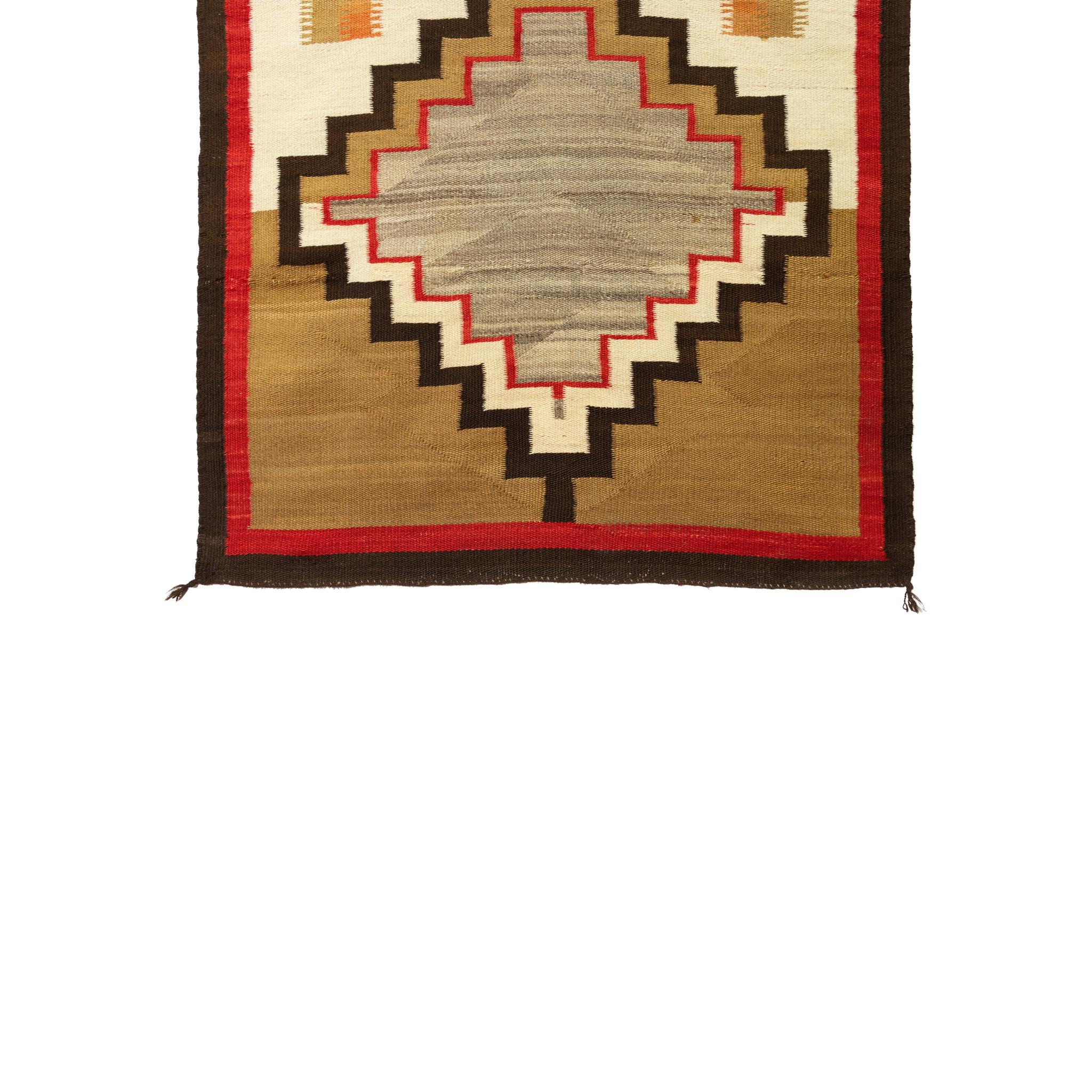Navajo crystal with graphic black and red borders. 6'2