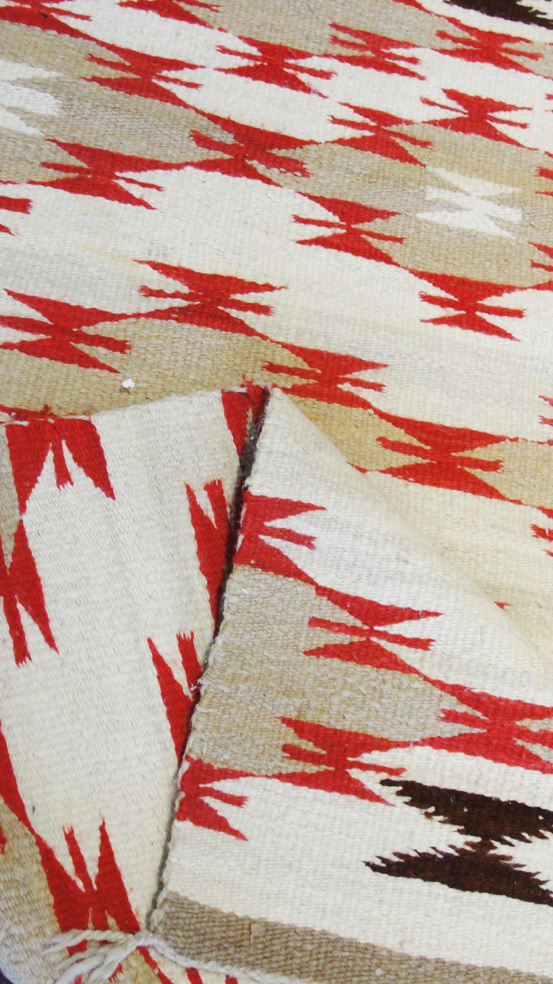 A typical Navajo rug has approximately 30 wefts to the linear inch. A two grey hills from Toadlena average about 45. The finer pieces frequently have upwards of 80. When a textile has 80 or more wefts per inch, it is considered a tapestry, not a