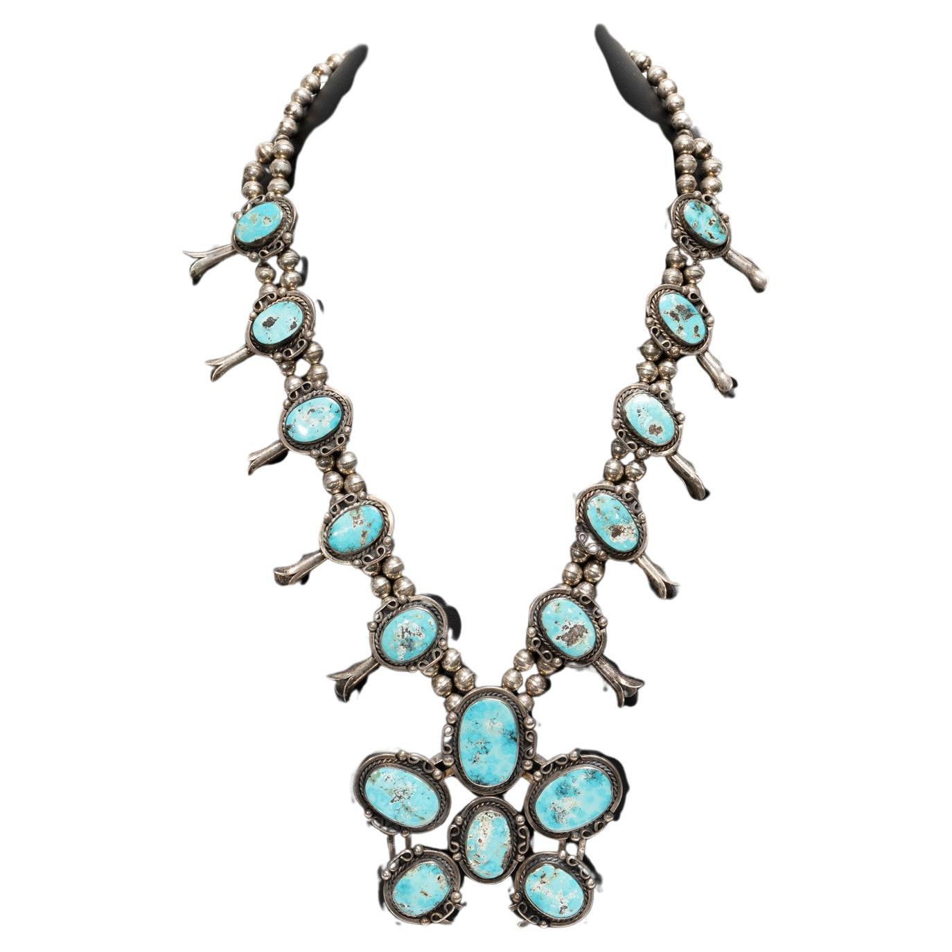 Turchese blu di Pasqua Navajo e fiore di zucca in argento sterling