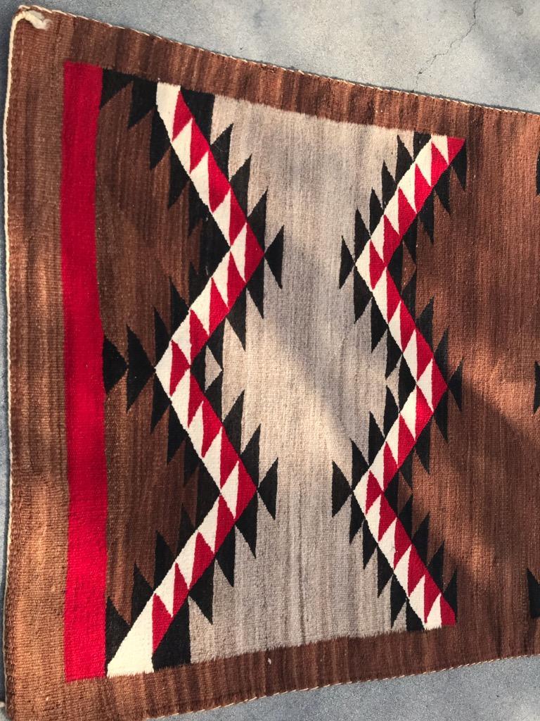 1930's Navajo  Indian eye dazzler weaving with flying geese pattern. The condition is very good.