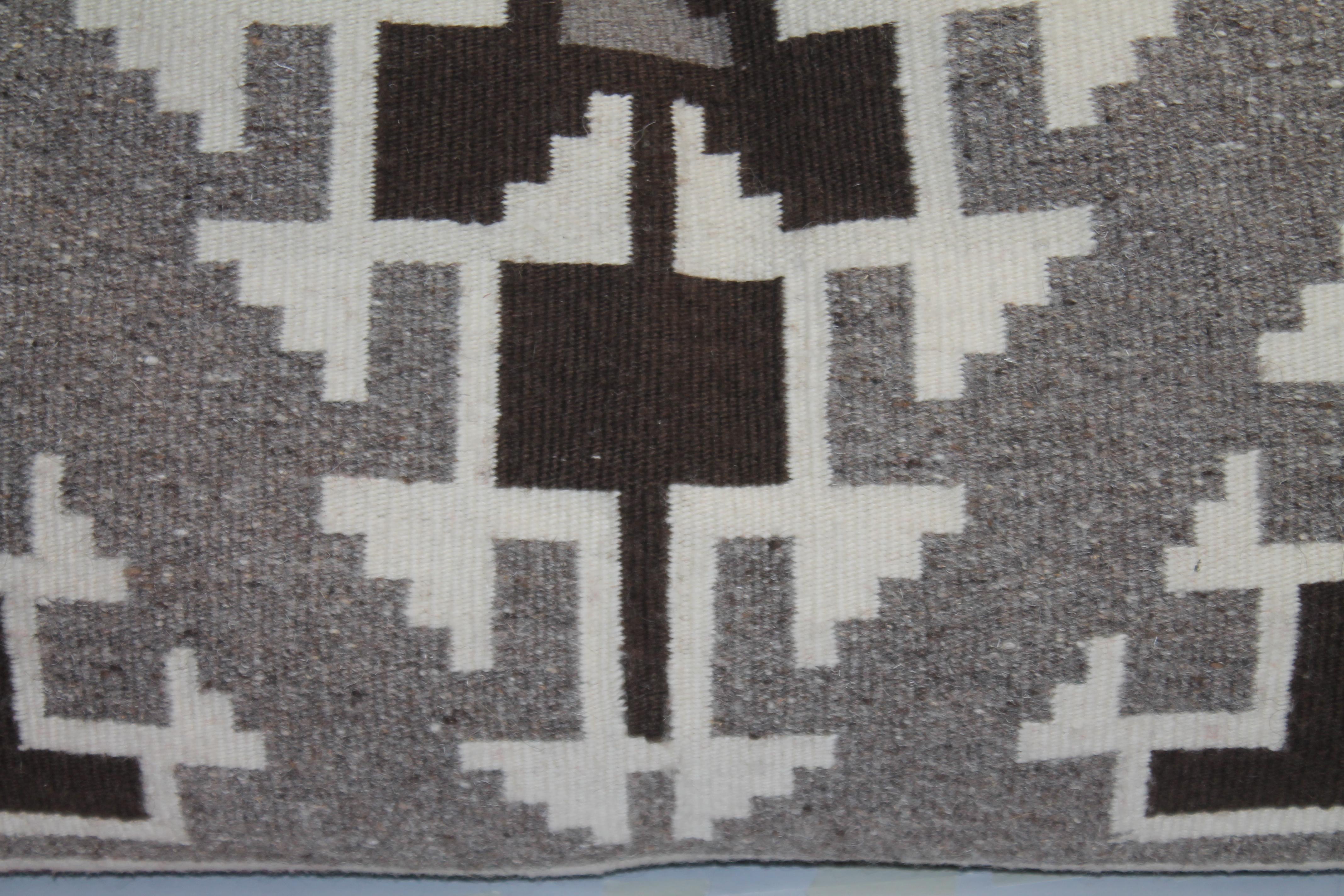 Pair of Navajo bolster Geometric Pillows with unusual color. The V shape design in the center and corners representing mountains. Great design and extremely attractive.