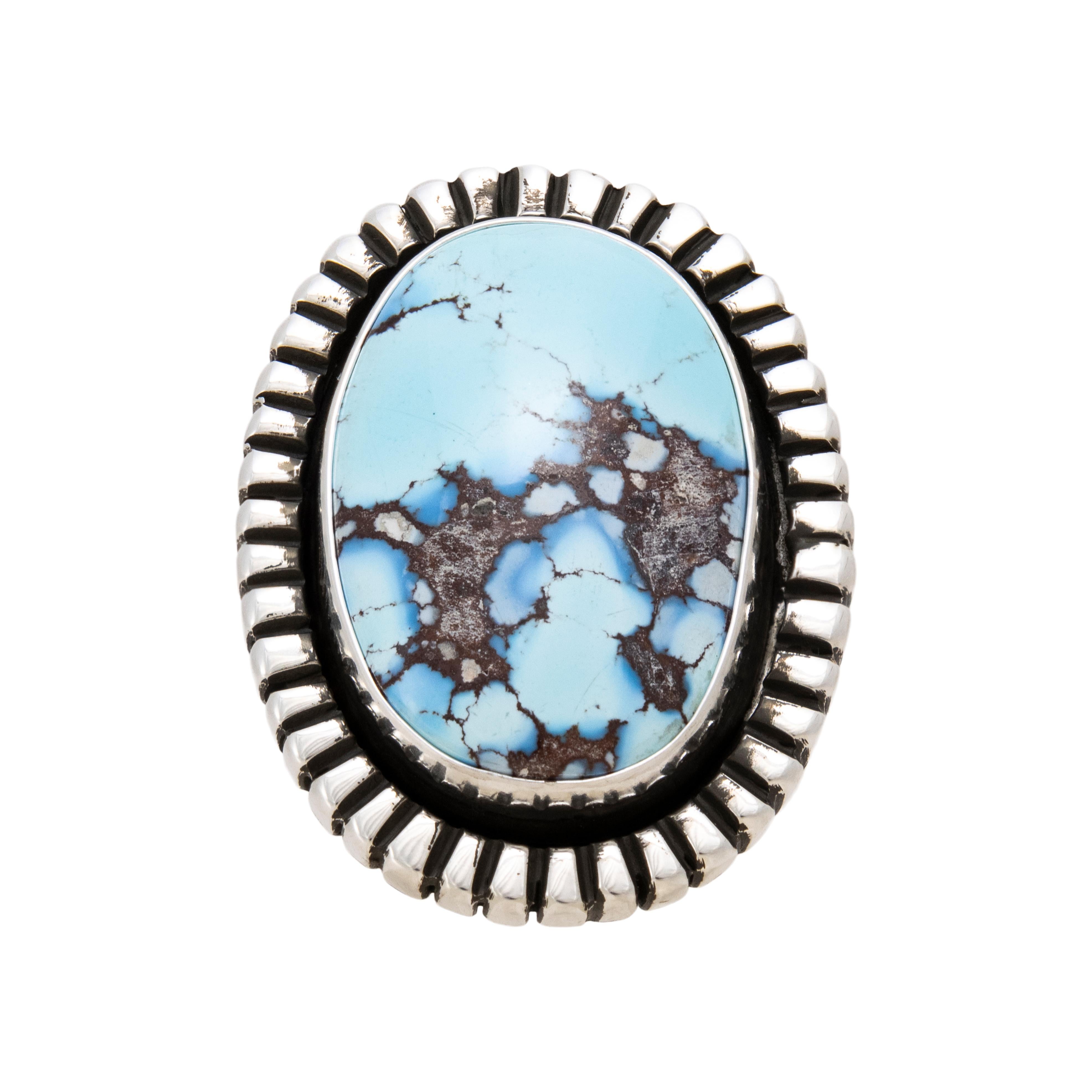 Navajo Golden Hill turquoise and sterling ring. Exceptional high-grade stone with excellent colors and depth surrounded by classic sterling border. Stone features the signature sky-blue color seen on Golden Hills stones with bold black and gray