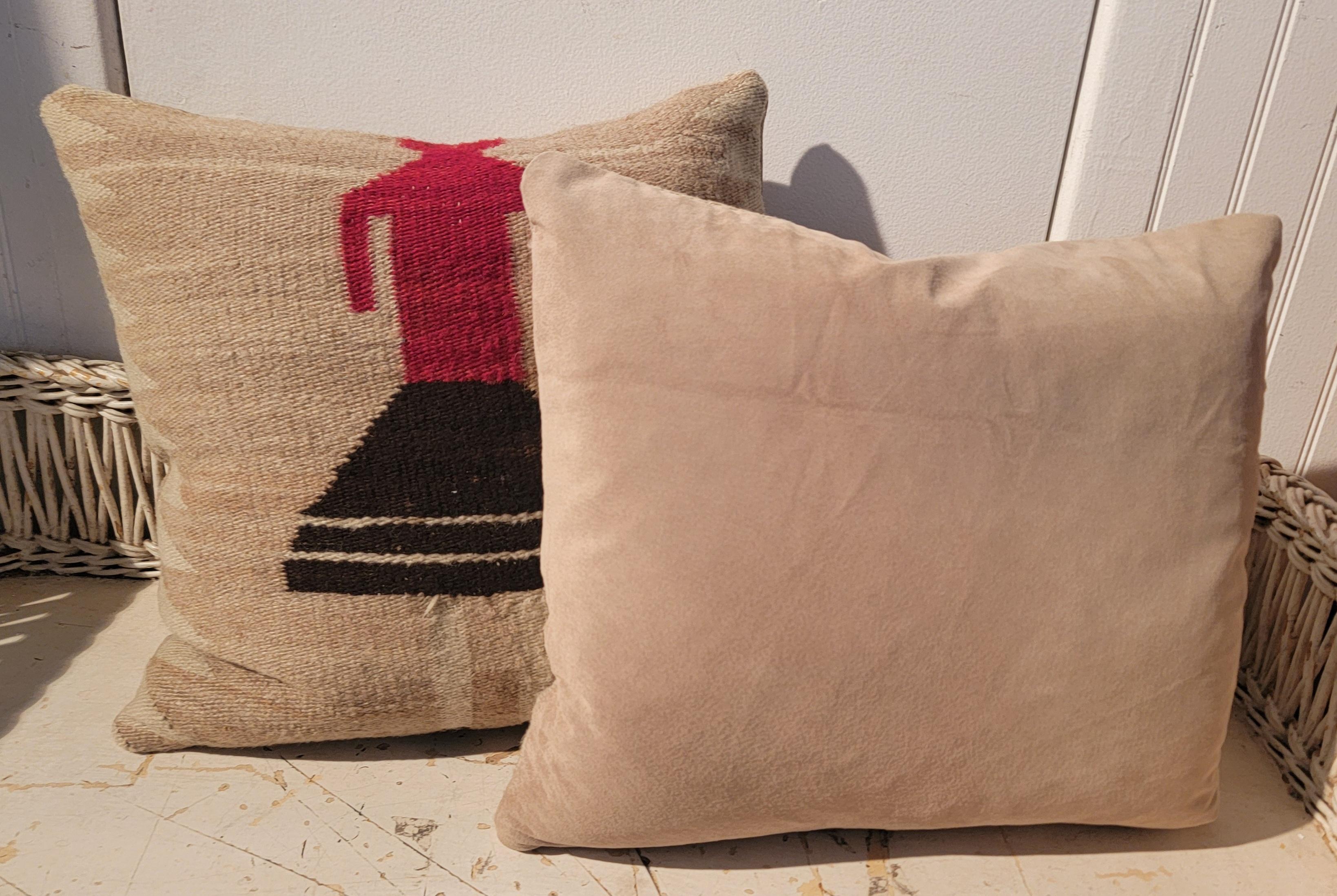 Navajo Indian weaving girl dancers pillows with suede backings and down & feather fill.They have minor spots or old aged spots.

Smaller pillow - 15 x 16
Larger pillow - 17 x 16