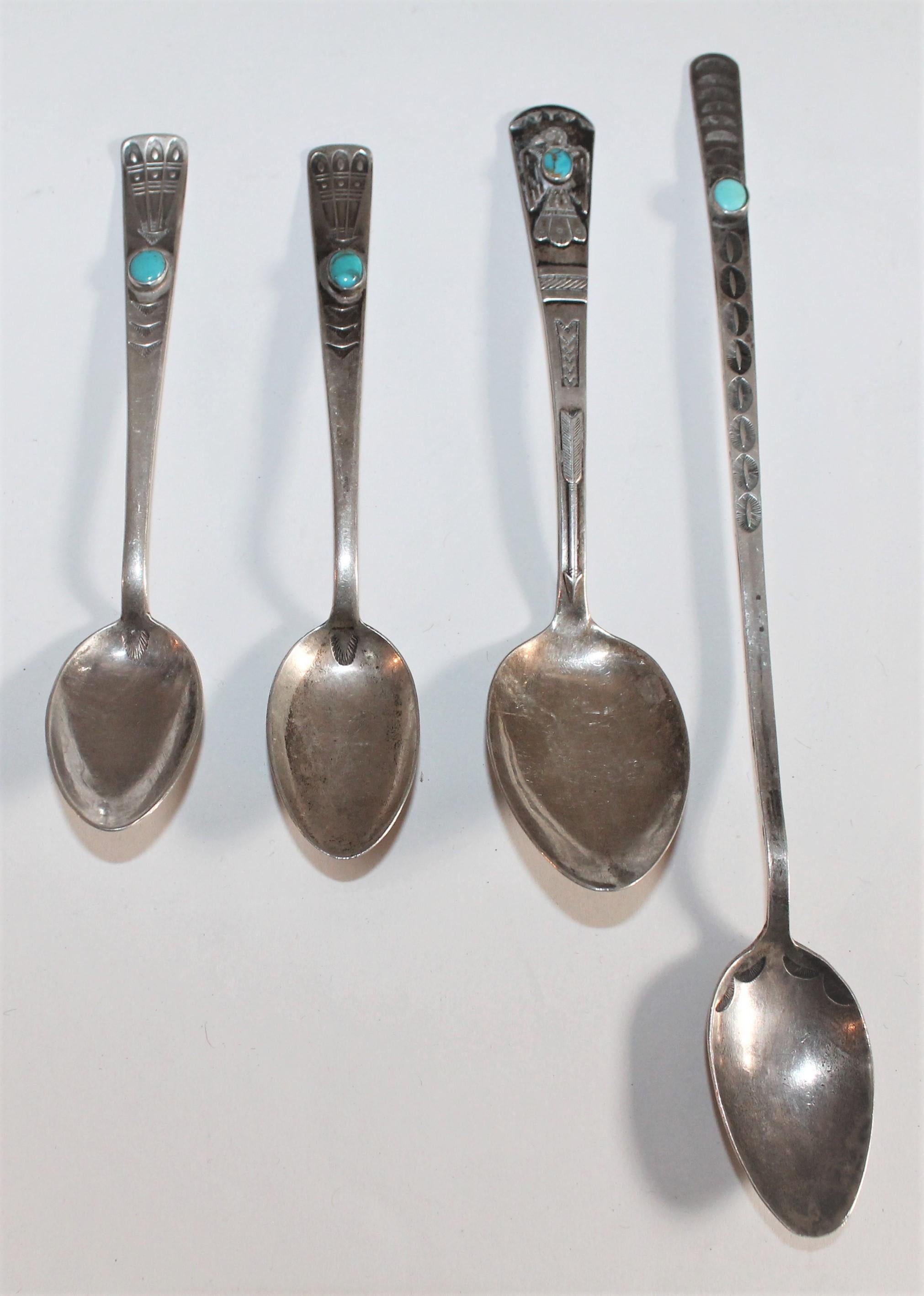 Collection of Navajo sterling spoons with turquoise. These great spoons are Navajo and have a beautiful Navajo pattern to them with great patina consistent of age and use.

Largest spoon measures - 8 x 1 x .25
Medium spoon measures - 5.75 x 1.25