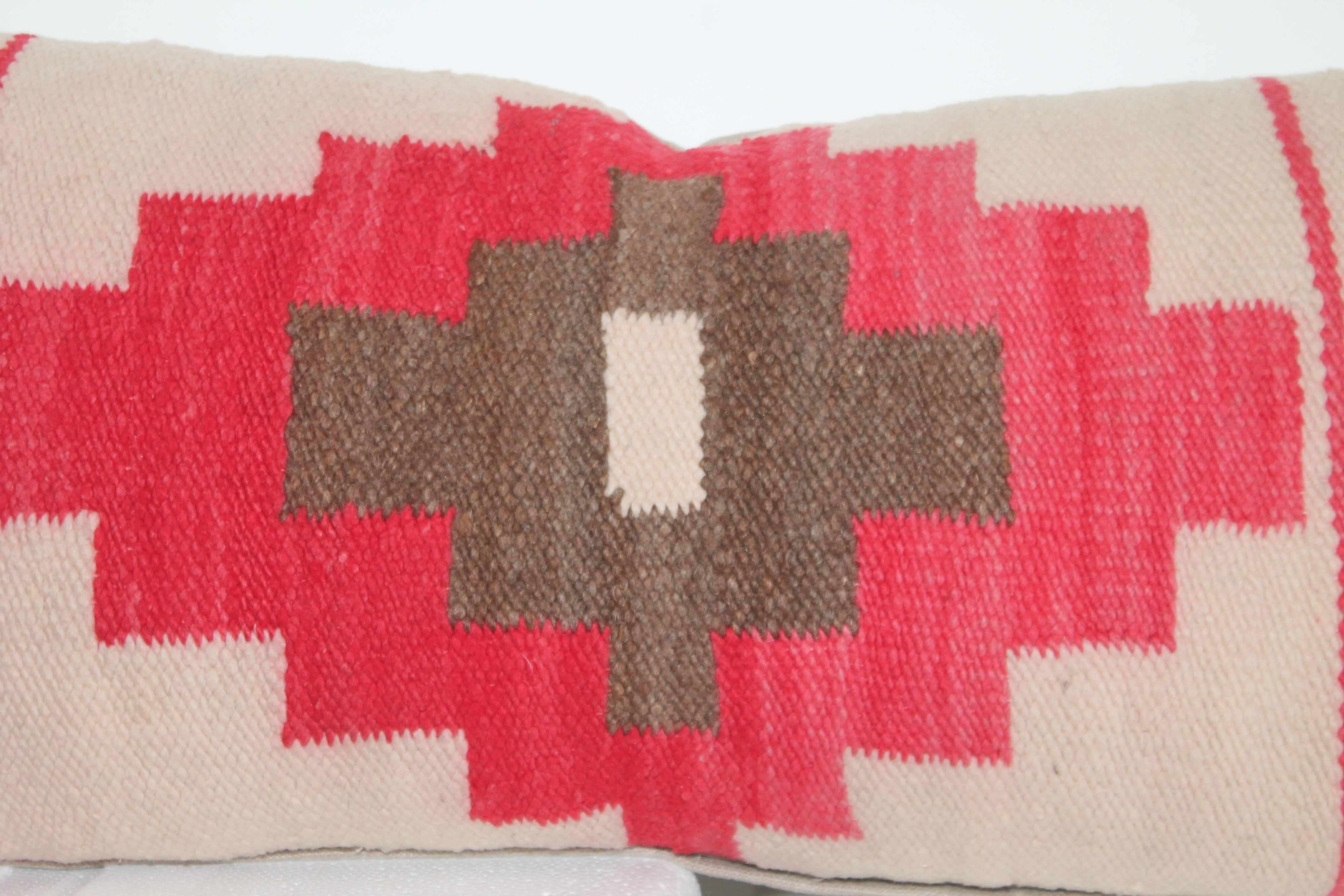 Navajo Indian weaving bolster pillow. The backing is in a taupe cotton linen. The insert is down & feather fill.