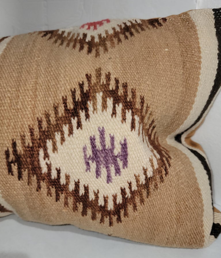 Early Navajo Indian weaving saddle blanket bolster pillow.Backing is in cotton linen & down & feather fill. Fantastic geometric design.