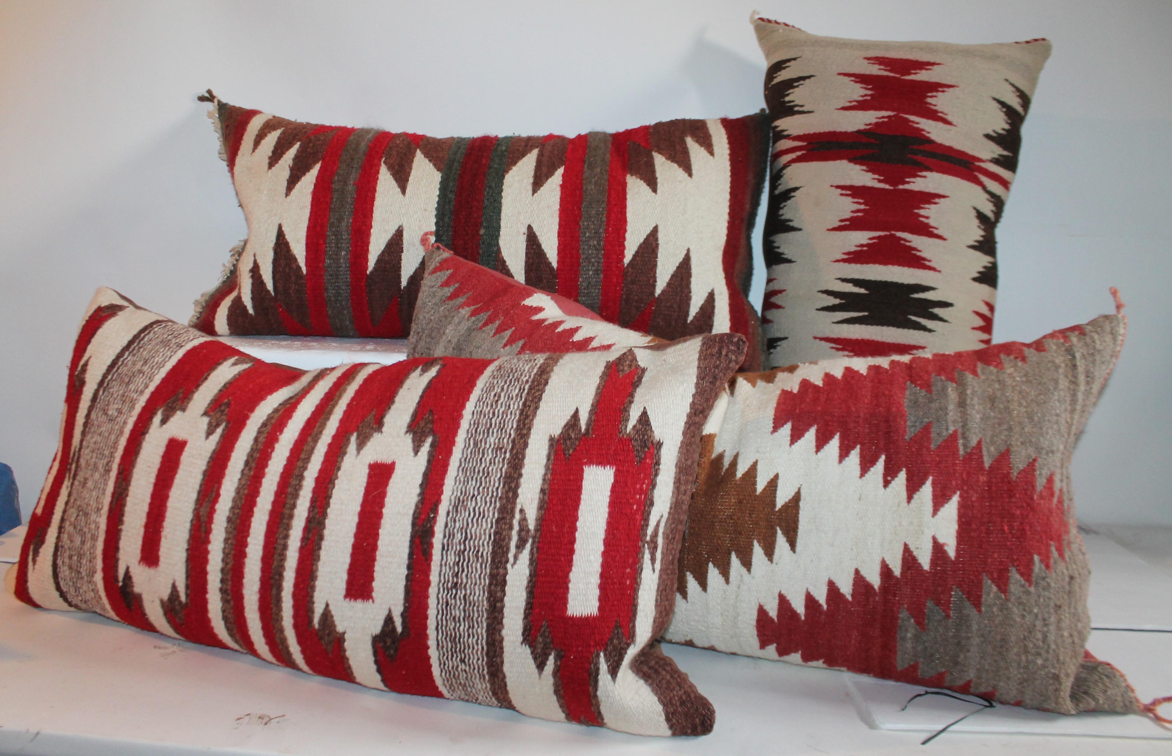 This collection of Navajo bolster pillows is hand selected for the beautiful colors and patterns showing a similar style. Each bolster is made from a different Navajo weaving / saddle blanket.
Sold as a collection of four.