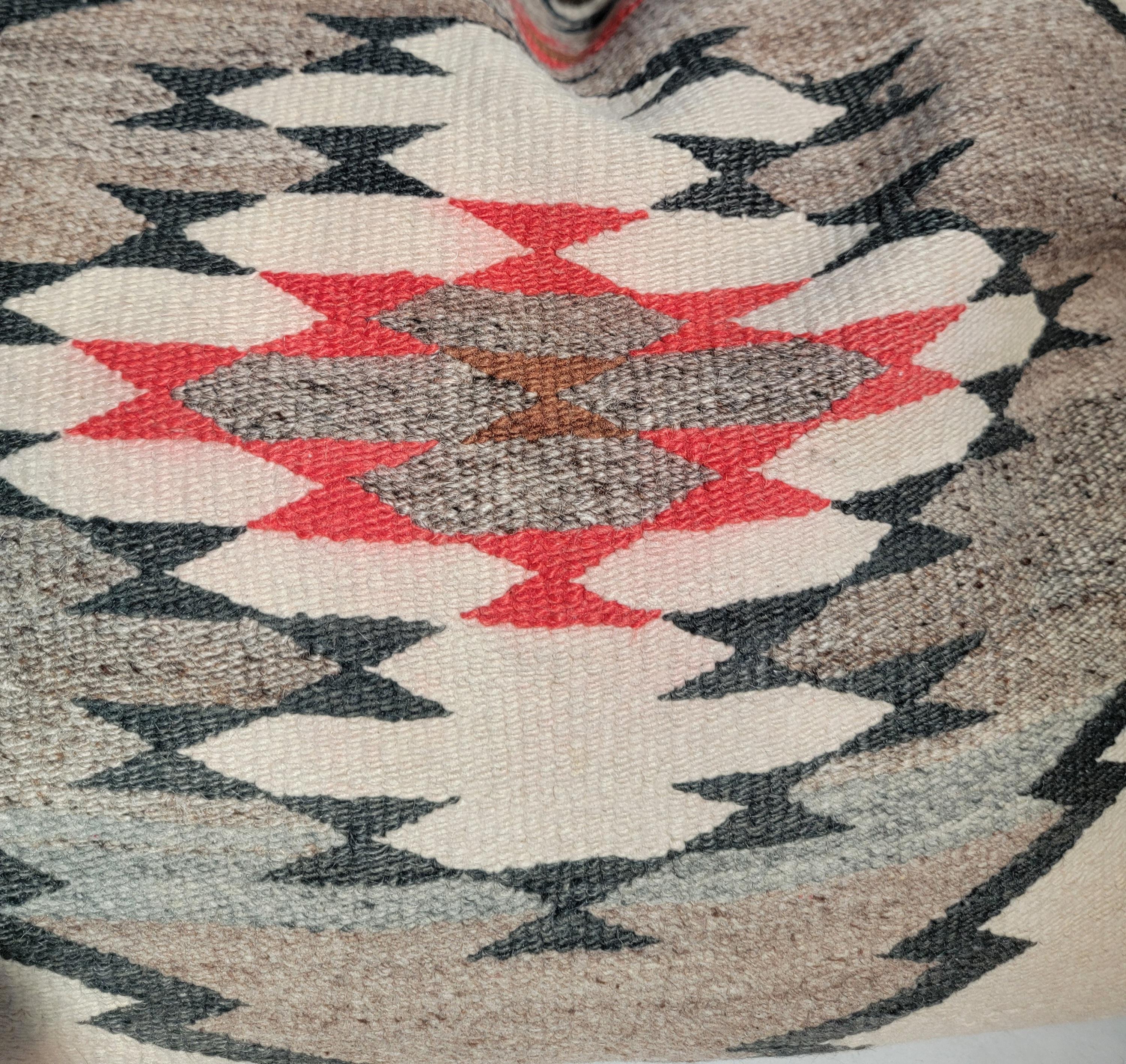 Navajo Indian weaving bolster pillows in large size.The inserts are down & feather fill.The backing are in cotton linen fabric.Sold as a pair.