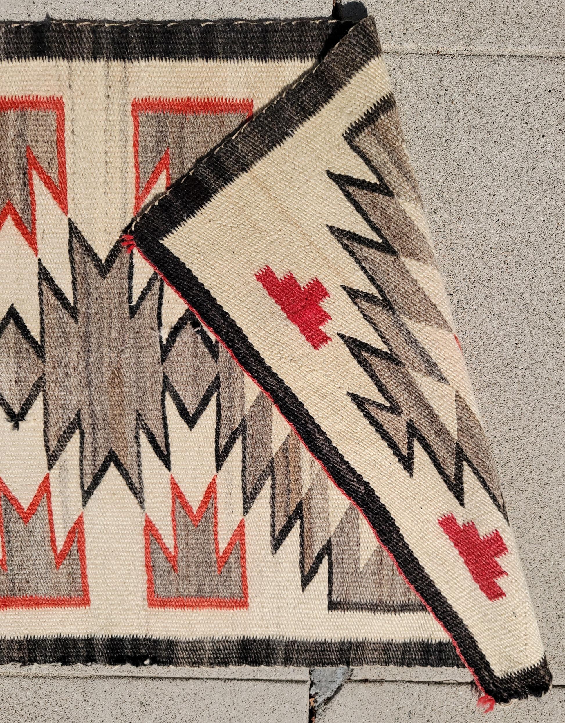 This fine and early Navajo Indian weaving is in very good condition and has been professionally cleaned.This weaving is an early rug.