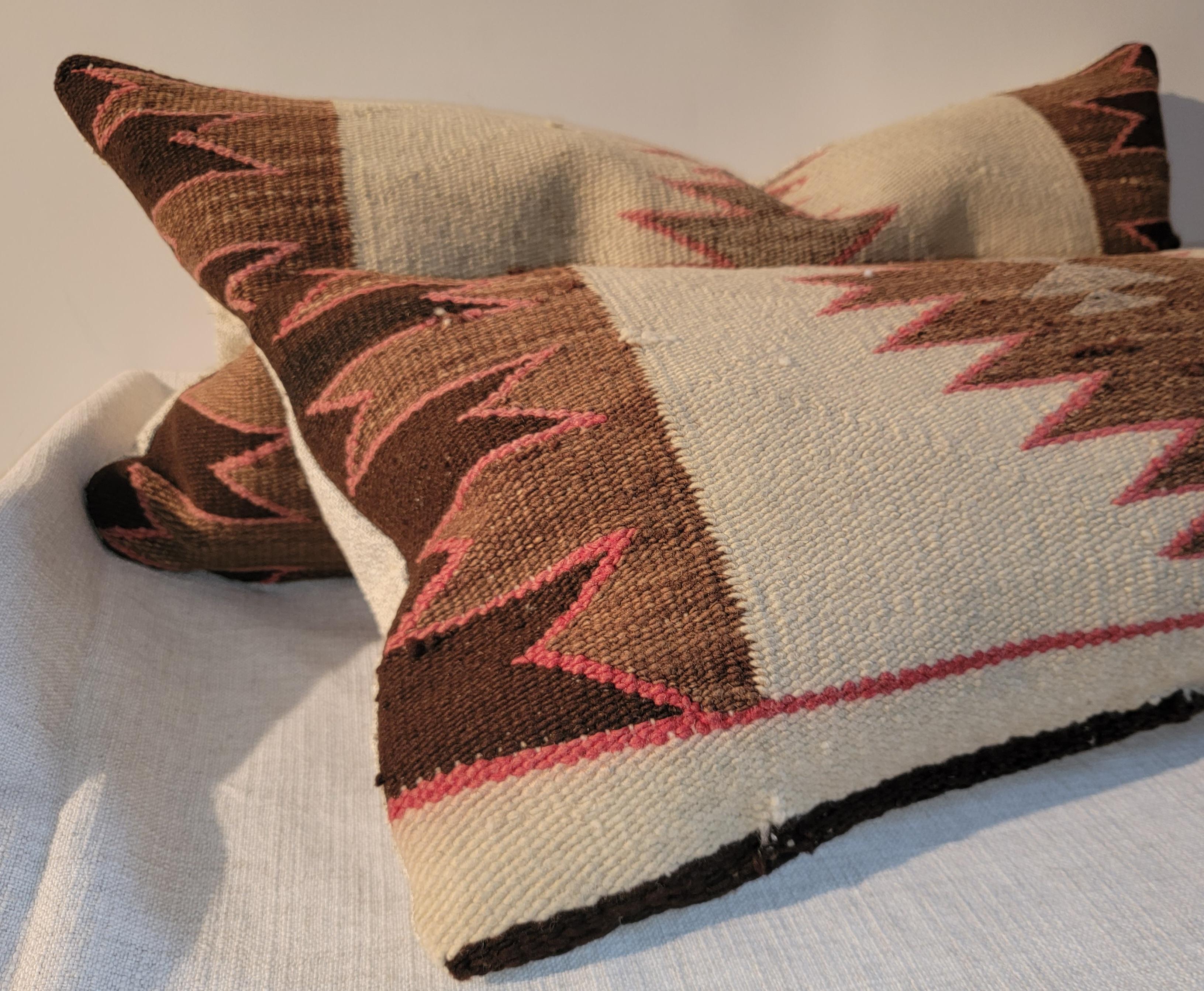 Navajo Indian Weaving Eye Dazzler Bolster pillows (Pair). Feather and down insert and zippered casing.
