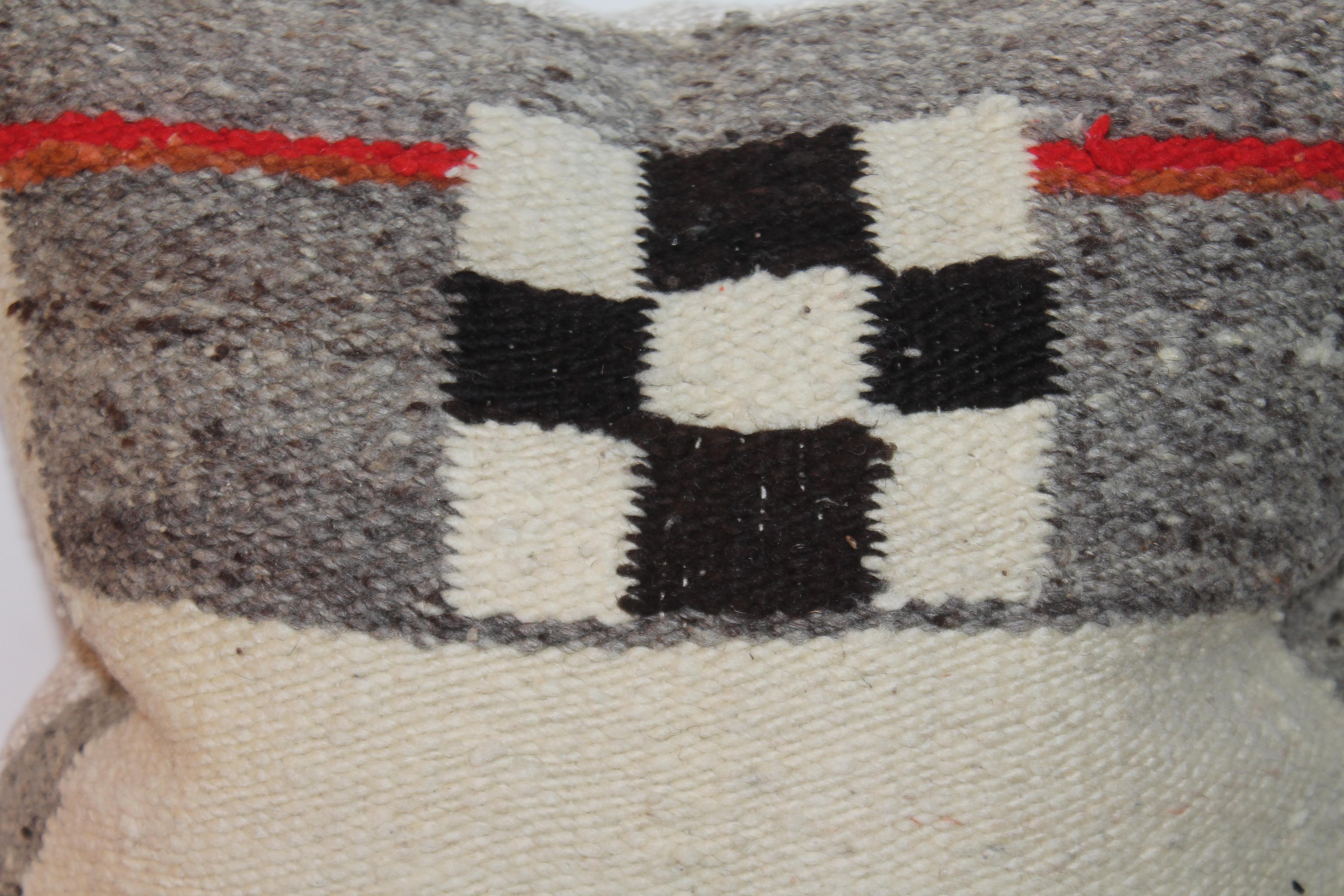 This most unusual hand woven lambs wool feeling Navajo weaving pillow is in fine condition. The backing is a cotton linen. The insert is down & feather fill.