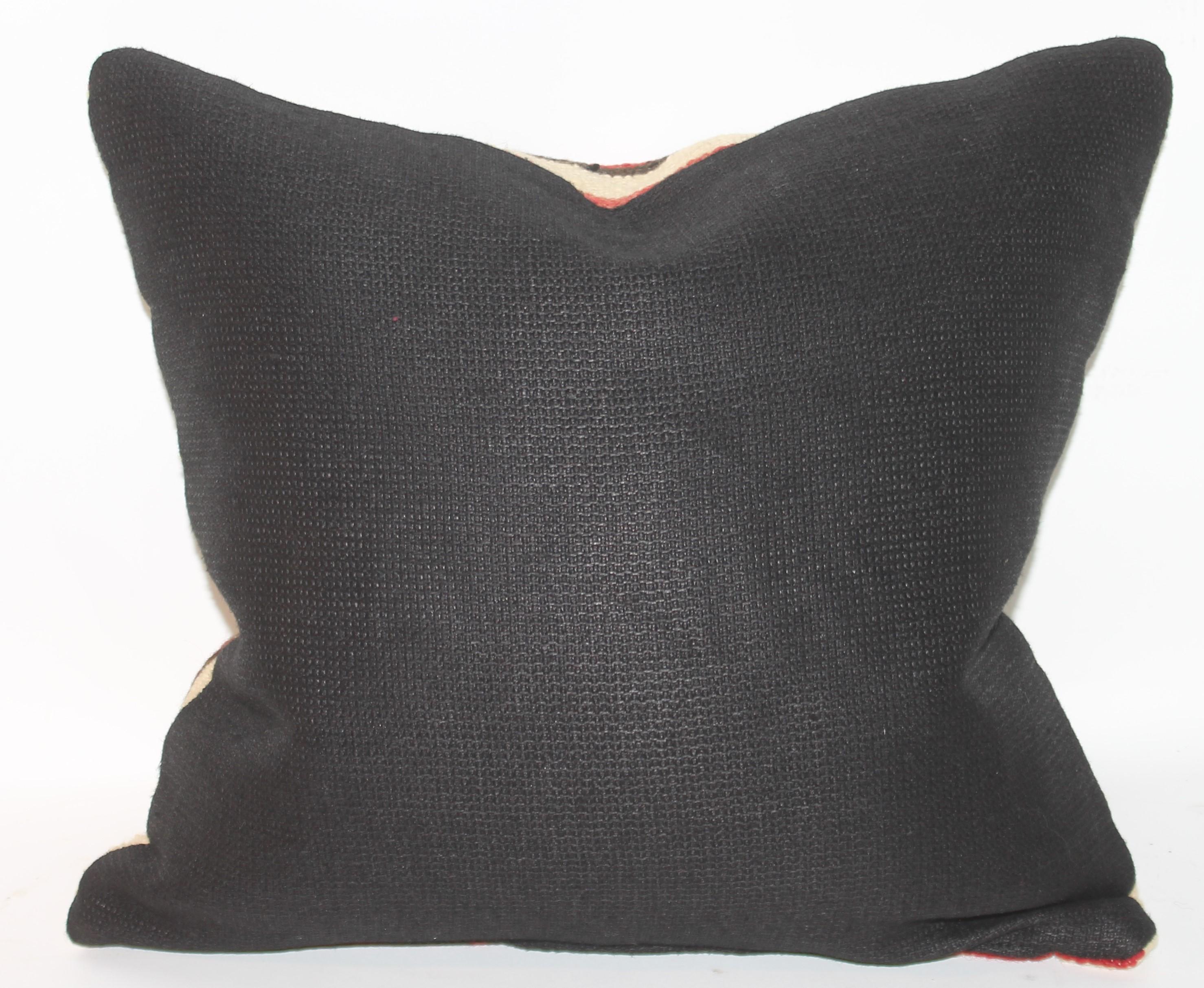 This geometric Navajo Indian weaving pillow is in good condition. The backing is in a dark black cotton linen.
