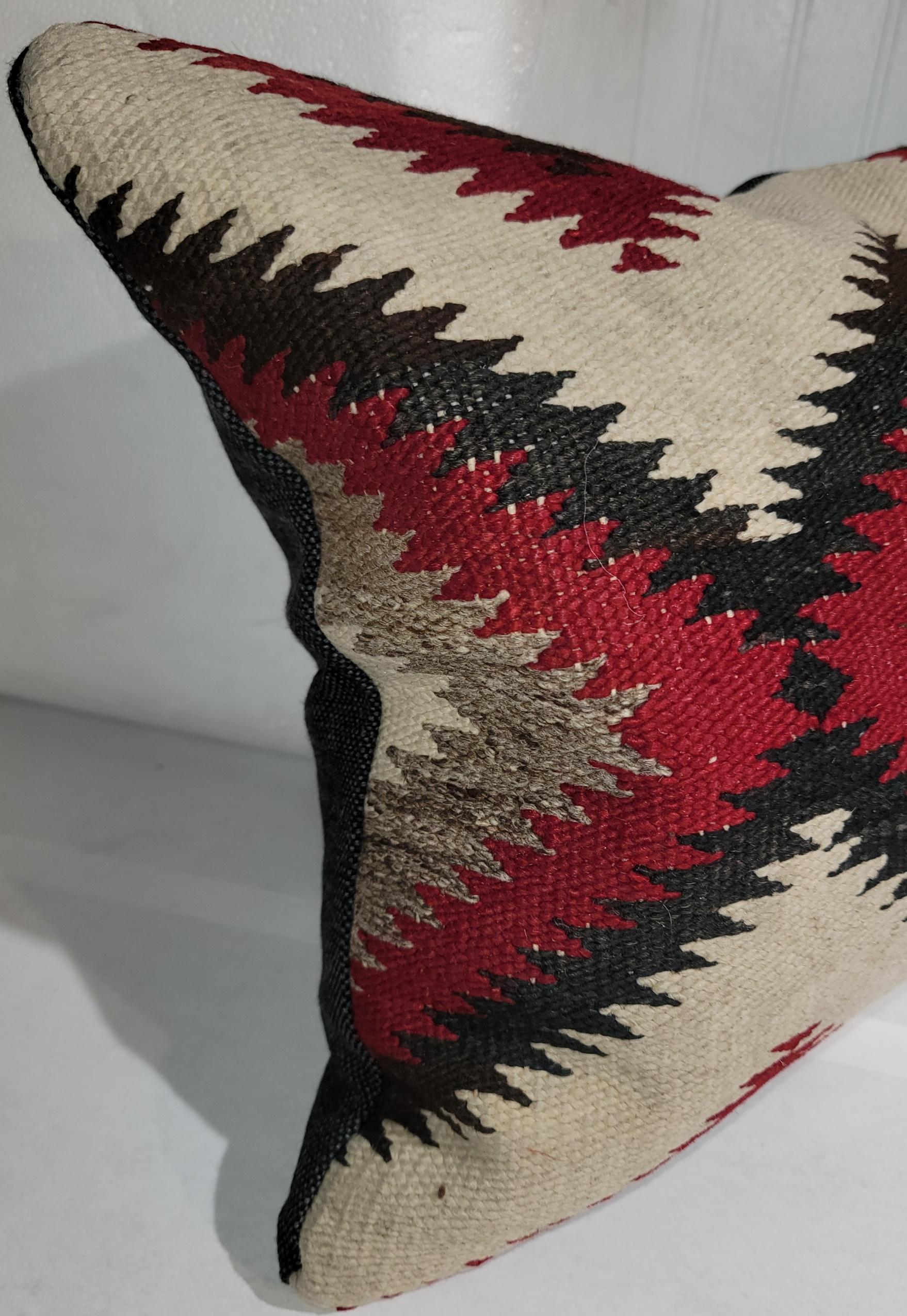 Early 20thc Navajo Indian weaving pillow with suede leather backing.The inserts are down & feather fill.