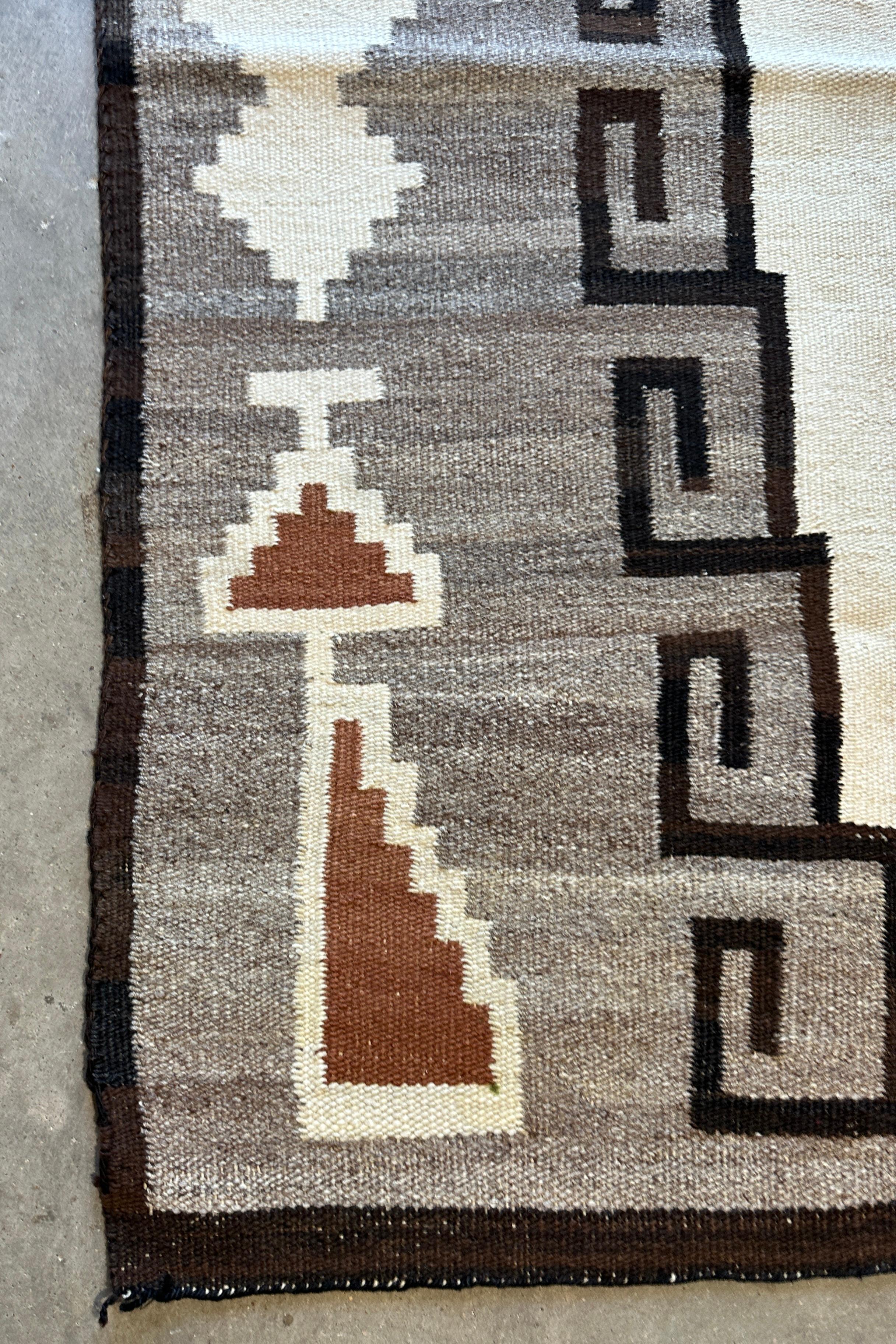 This is a fine Navajo Indian weaving in the storm pattern.