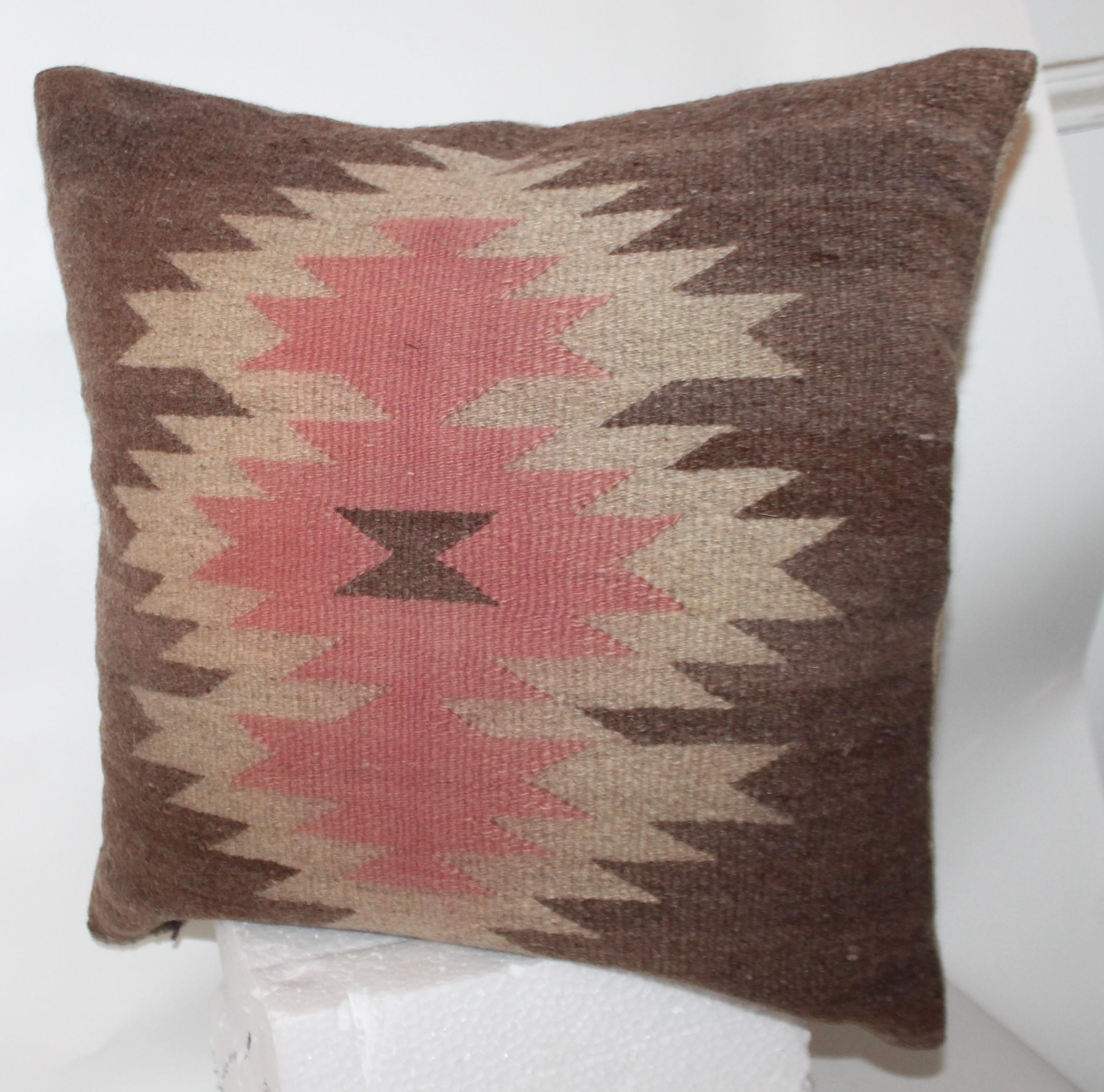 This is such unusual colors and fine weaving with such somber colors. The backing is in a thick homespun linen.