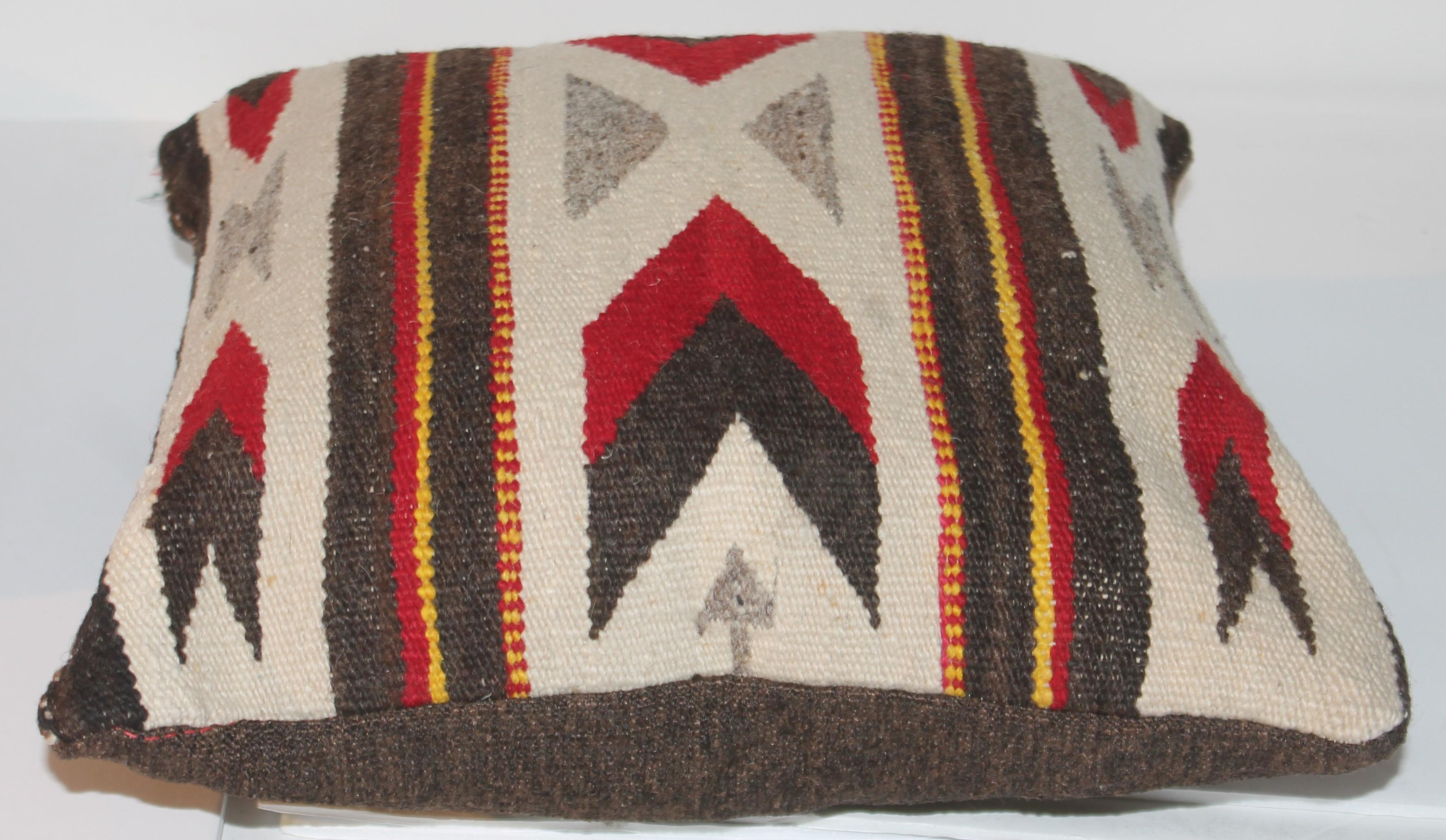 Navajo Indian weaving pillow. Down and feather insert and zippered casing.