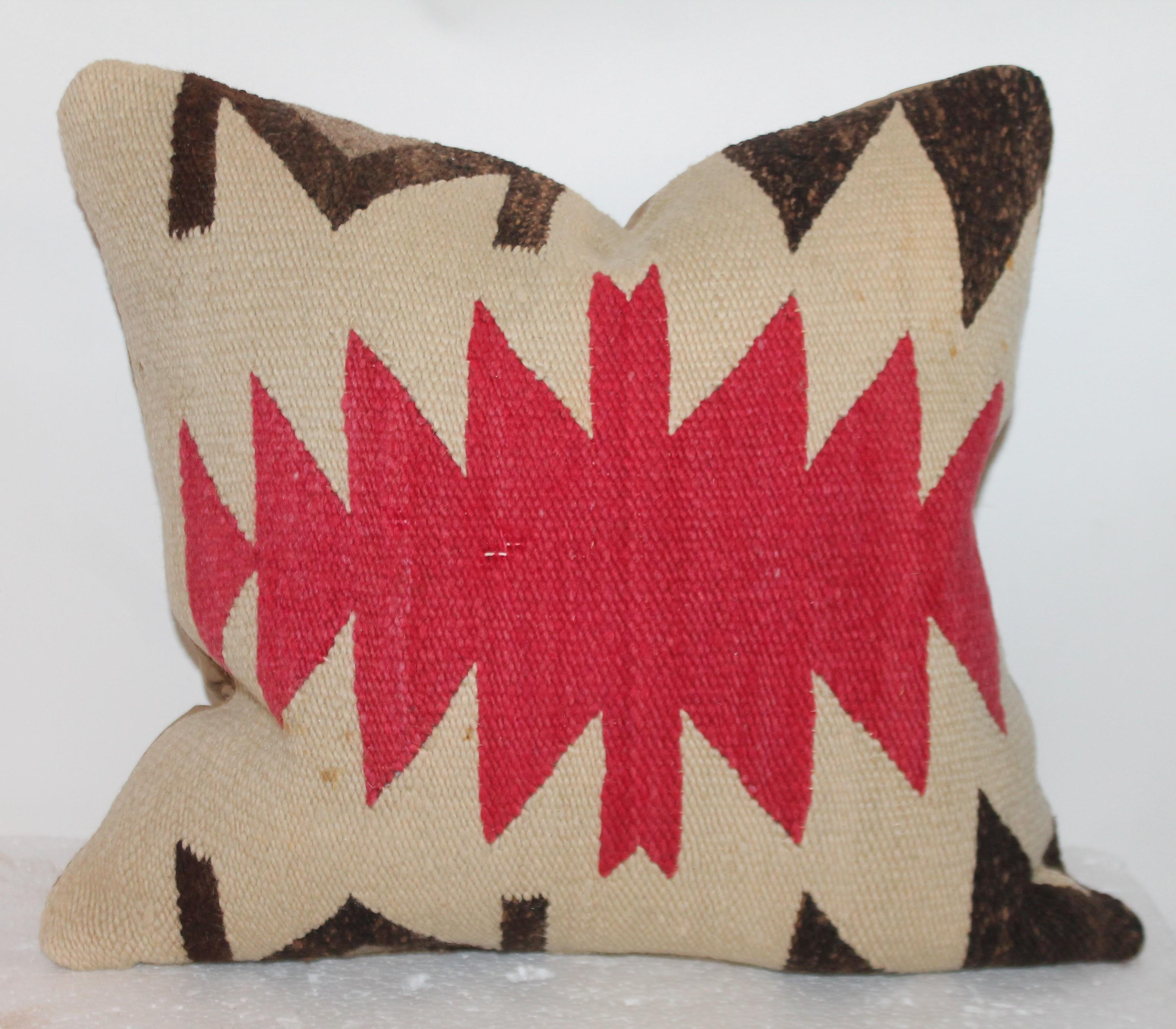 These Indian weaving pillows have tan suede backings and in fine condition. Fantastic style and colors. Sold as a pair.