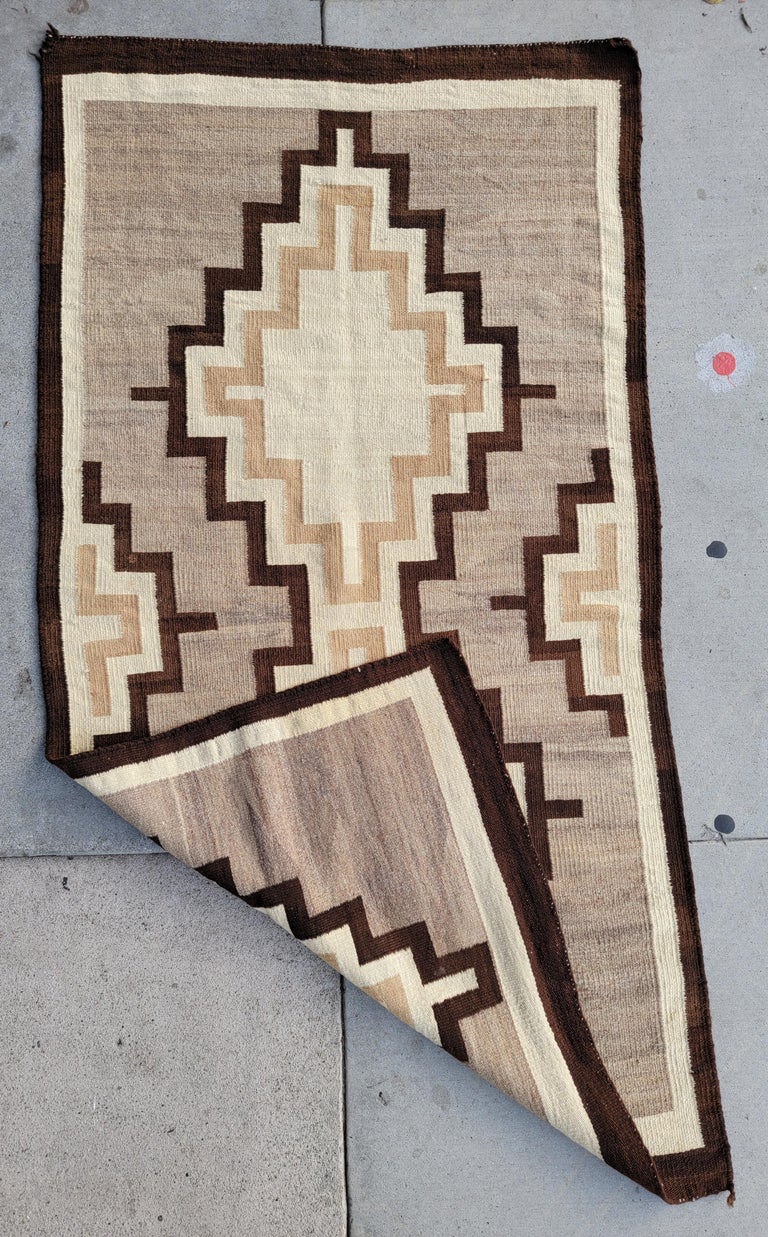 This amazing Navajo Indian weaving rug is in fine condition. The pattern is simple and fantastic colors.