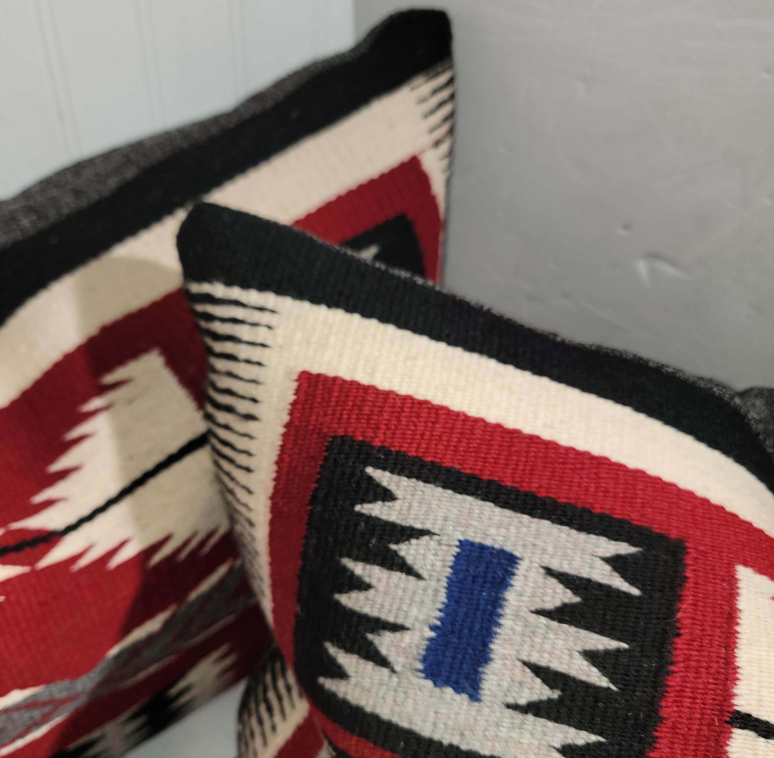 Navajo Indian Weaving saddle blanket pillows with wool backings.The inserts are down & feather fill.