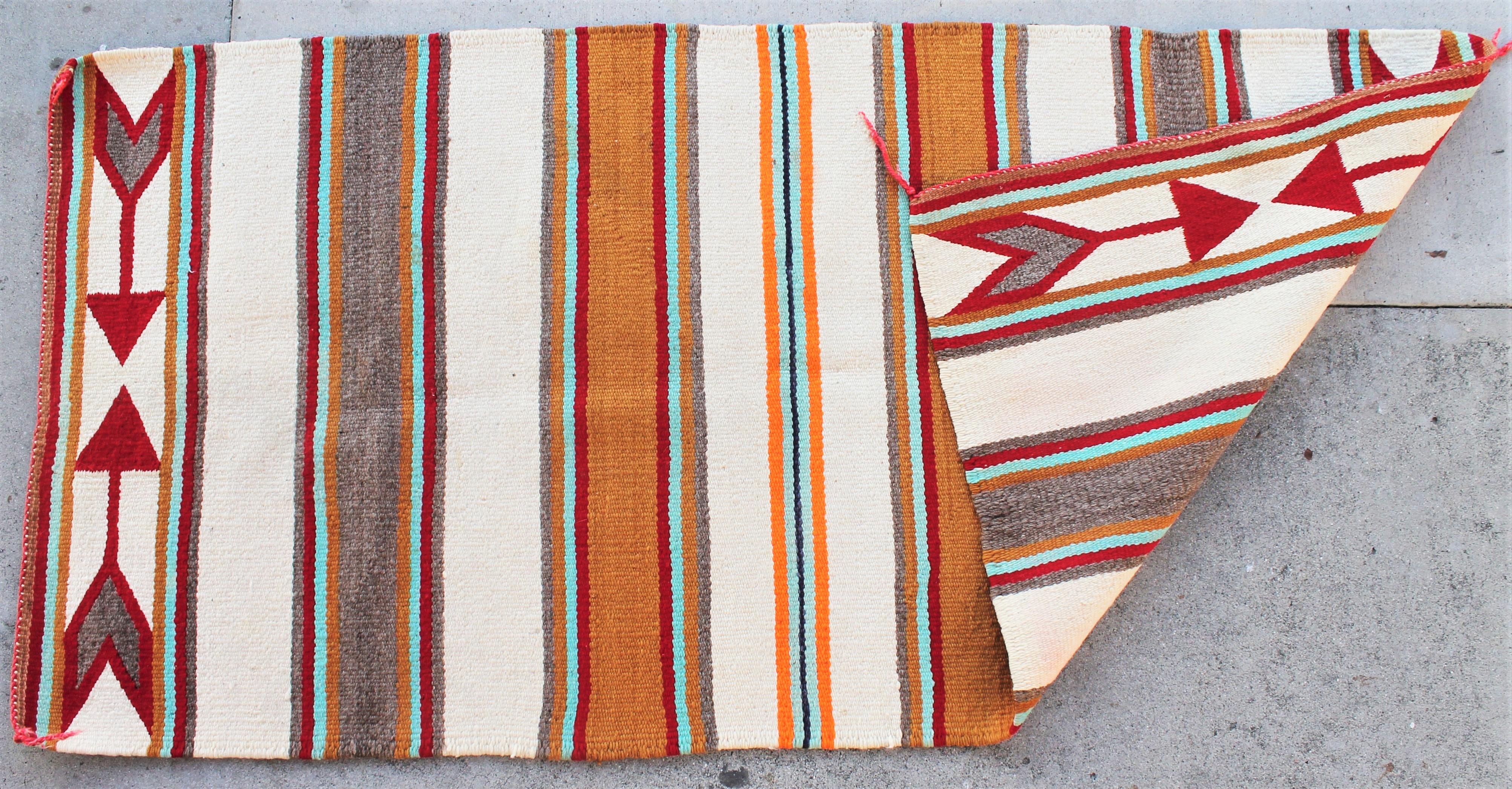 Navajo Indian weaving rug is in very good condition and has the original corner ties.