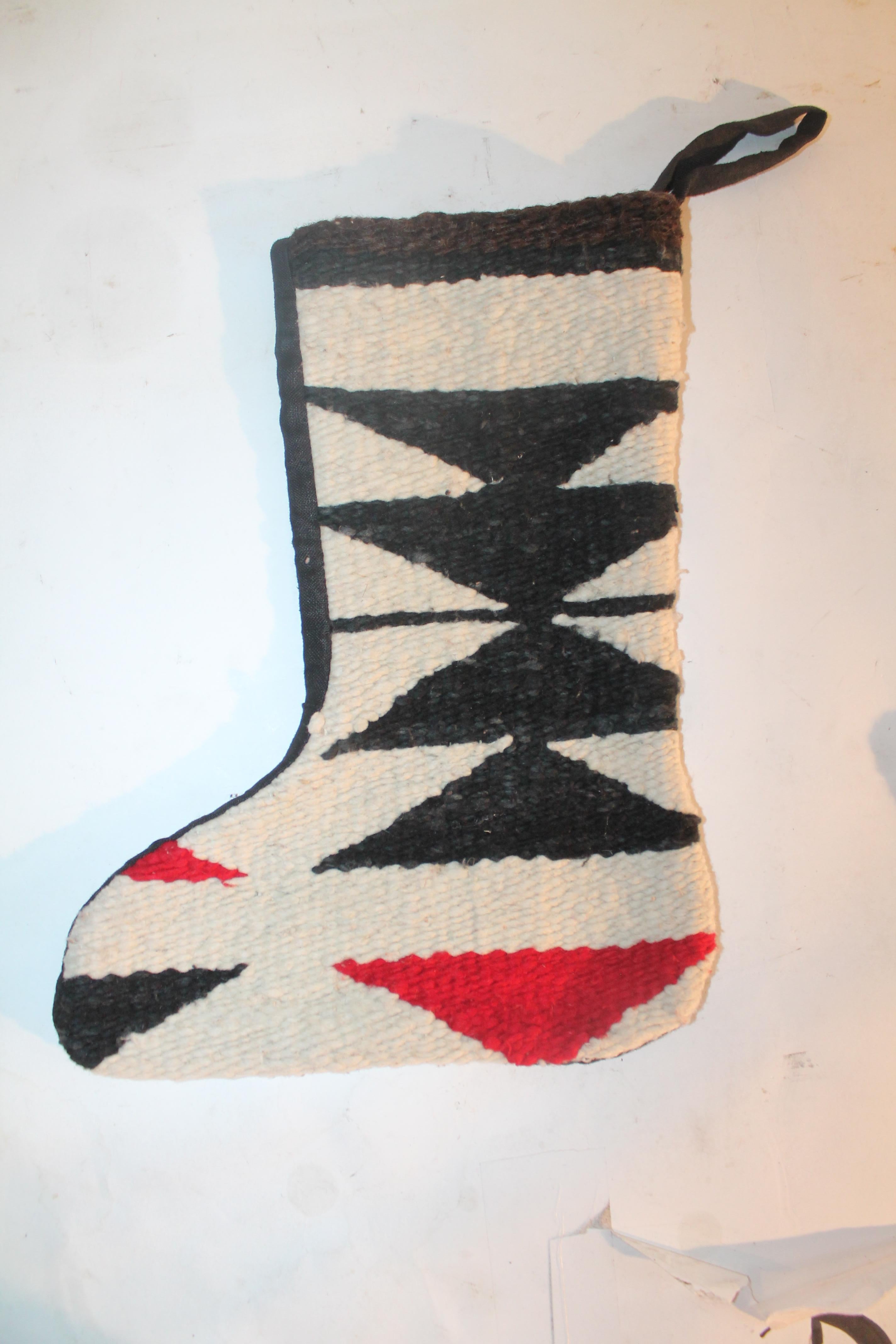 These handmade Navajo Indian weaving Christmas stockings are newly made from vintage weaving's. They make great gifts!! Sold as a pair. The backings are in black cotton linen. Only made for the holidays!