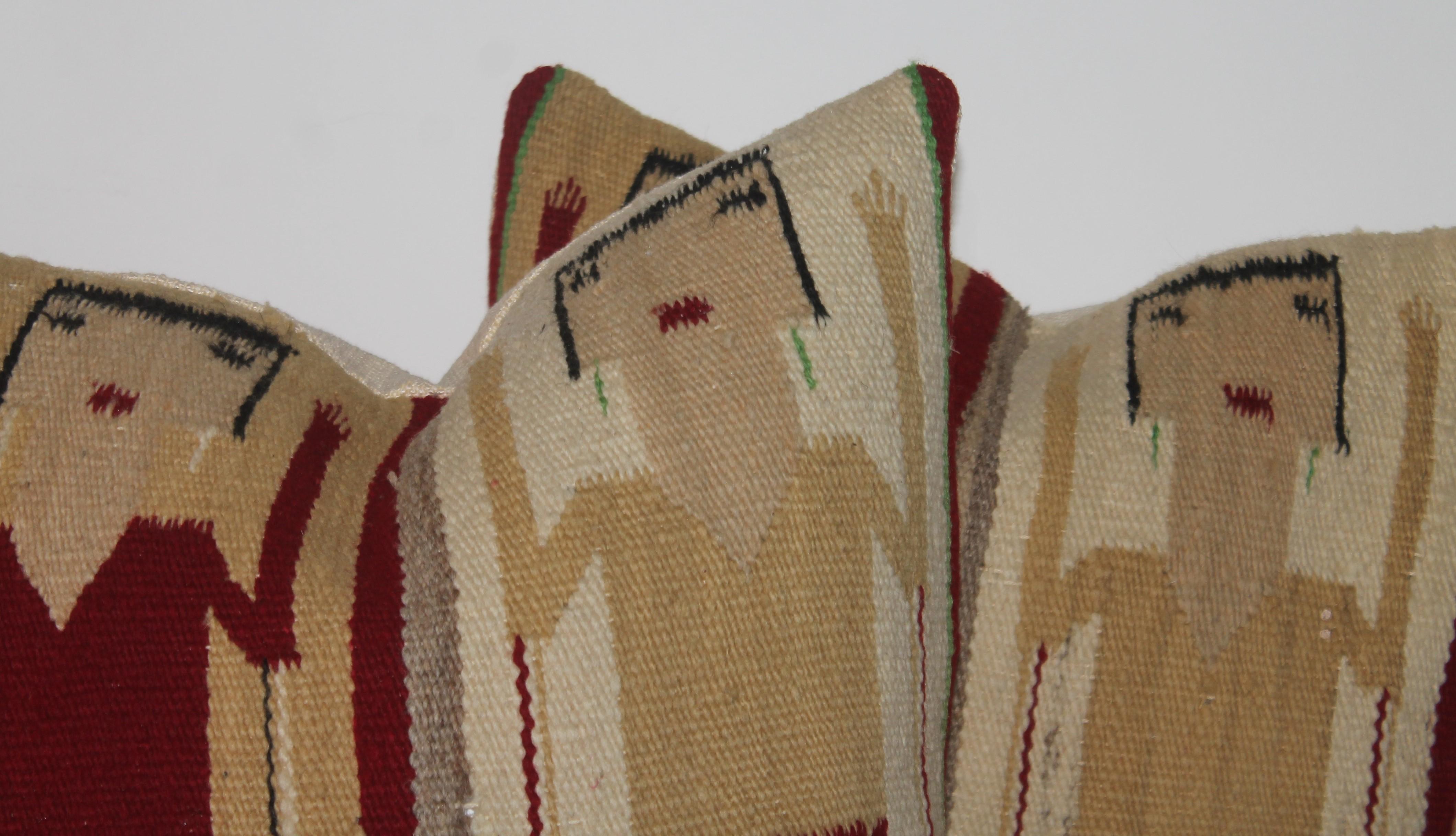 This fine pair of Navajo Indian weaving Yei pillows are in great condition. The inserts are down & feather fill.