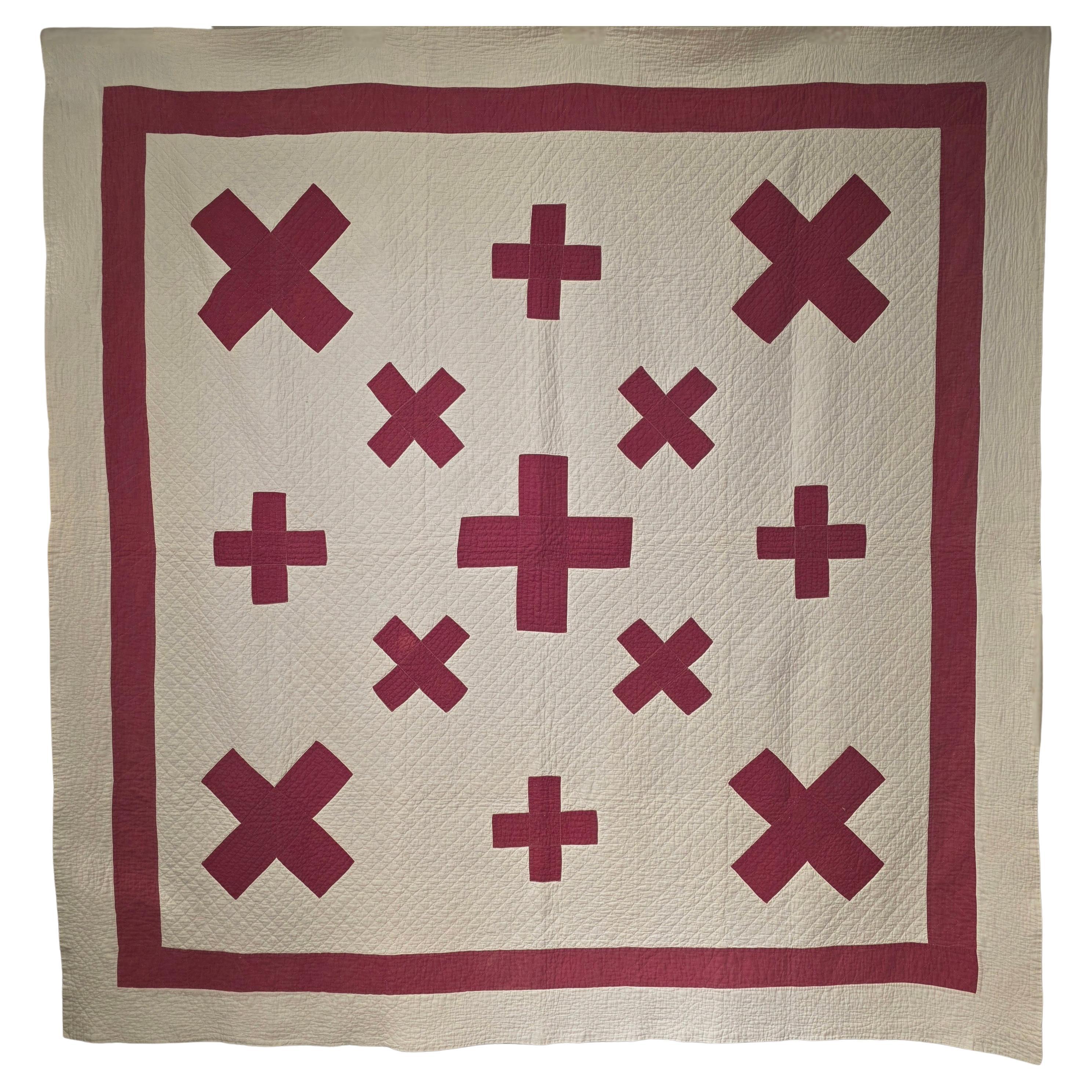Rara colcha americana del siglo XIX, tal vez un diseño único. La evidente influencia navajo de la Red Cross que simboliza a la Mujer Araña es incuestionable. El hecho de que sean 13 cruces también está relacionado con la creencia de los navajos de