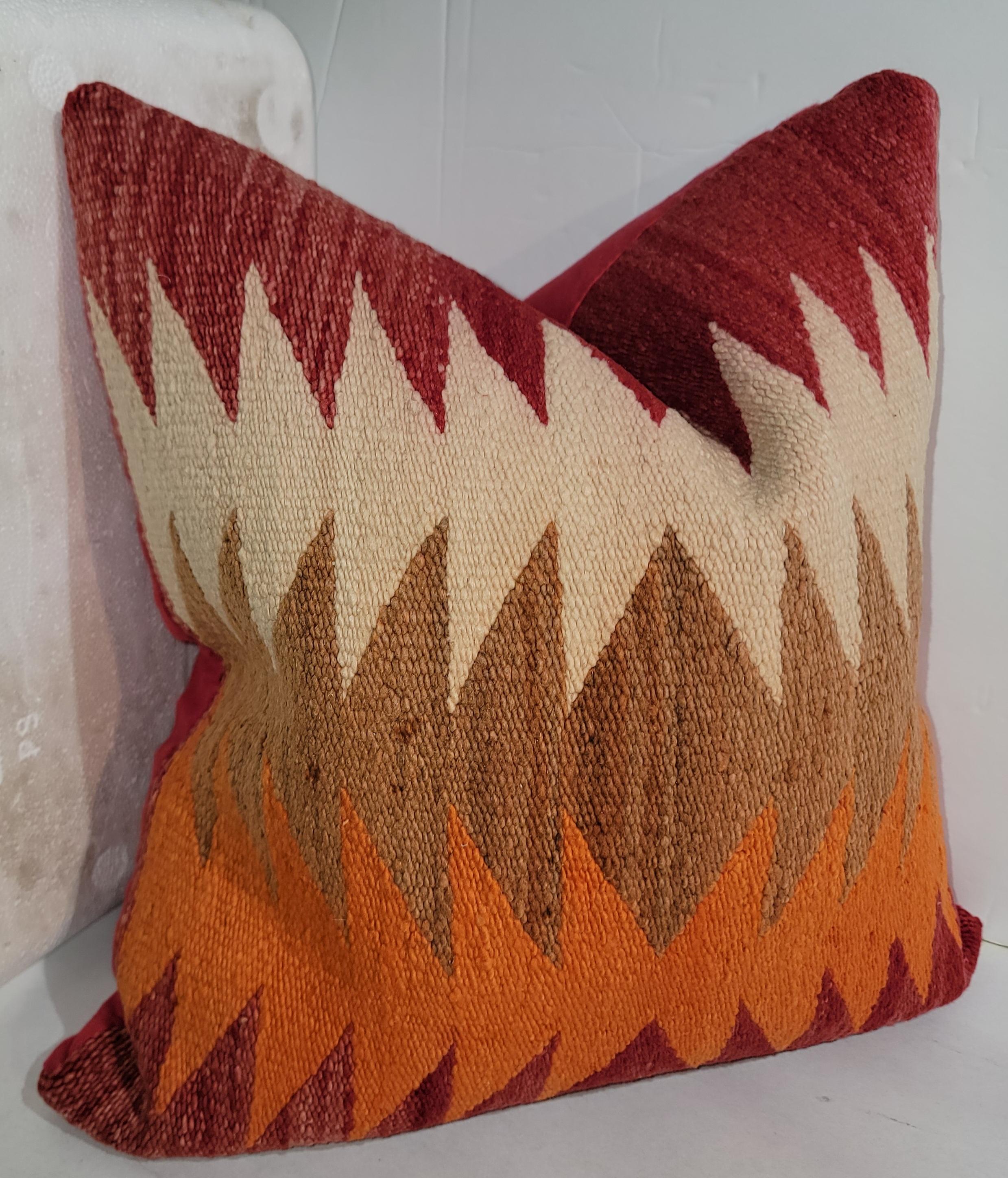 Navajo Jigsaw pattern pillow with great color red flame style jigsaw with unusual red, beige and orange color. This Pillow has been fitted wit ha down and feather insert.