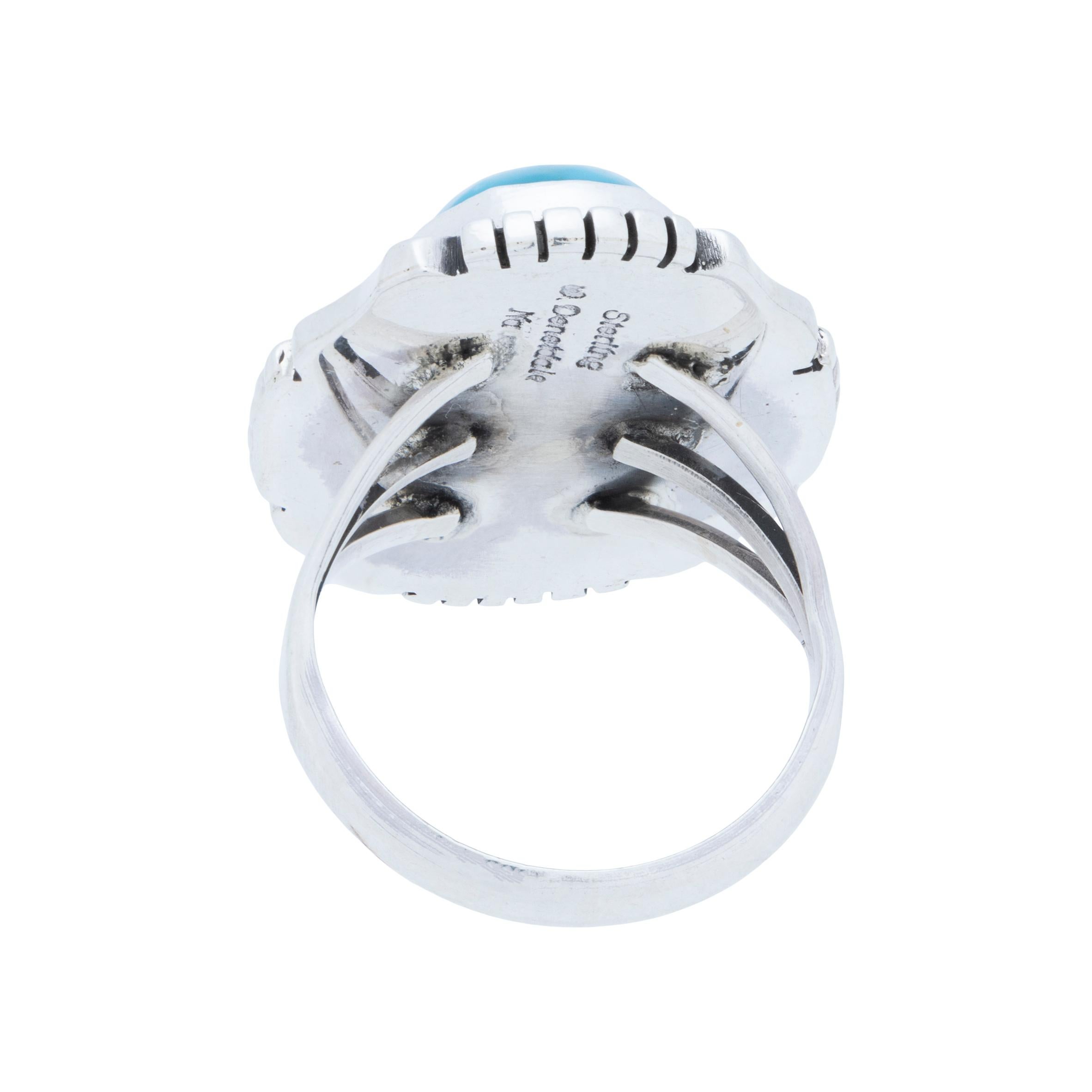 Navajo sterling silver and Kingman turquoise ring. Natural, untreated stone atop a classic twisted rope border with slash marks and hand stamped palmettes. Made by Navajo Silversmith W. Will Denetdale and stamped 