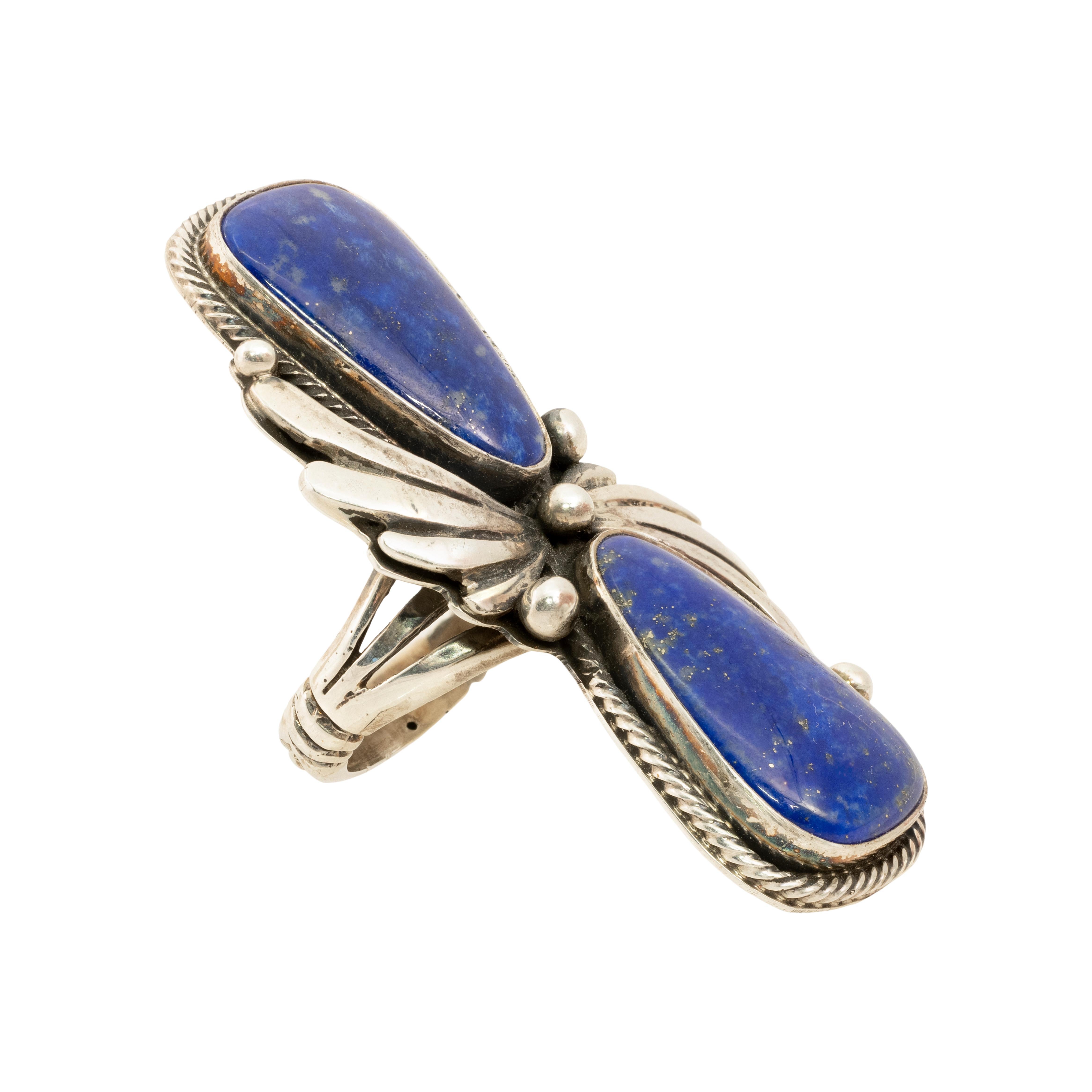 B. Richards sterling double stone ring with natural lapis stones at each end and accented with a tiny rope design. The center has raindrop beads and twisted sterling for additional accents. Stamped 