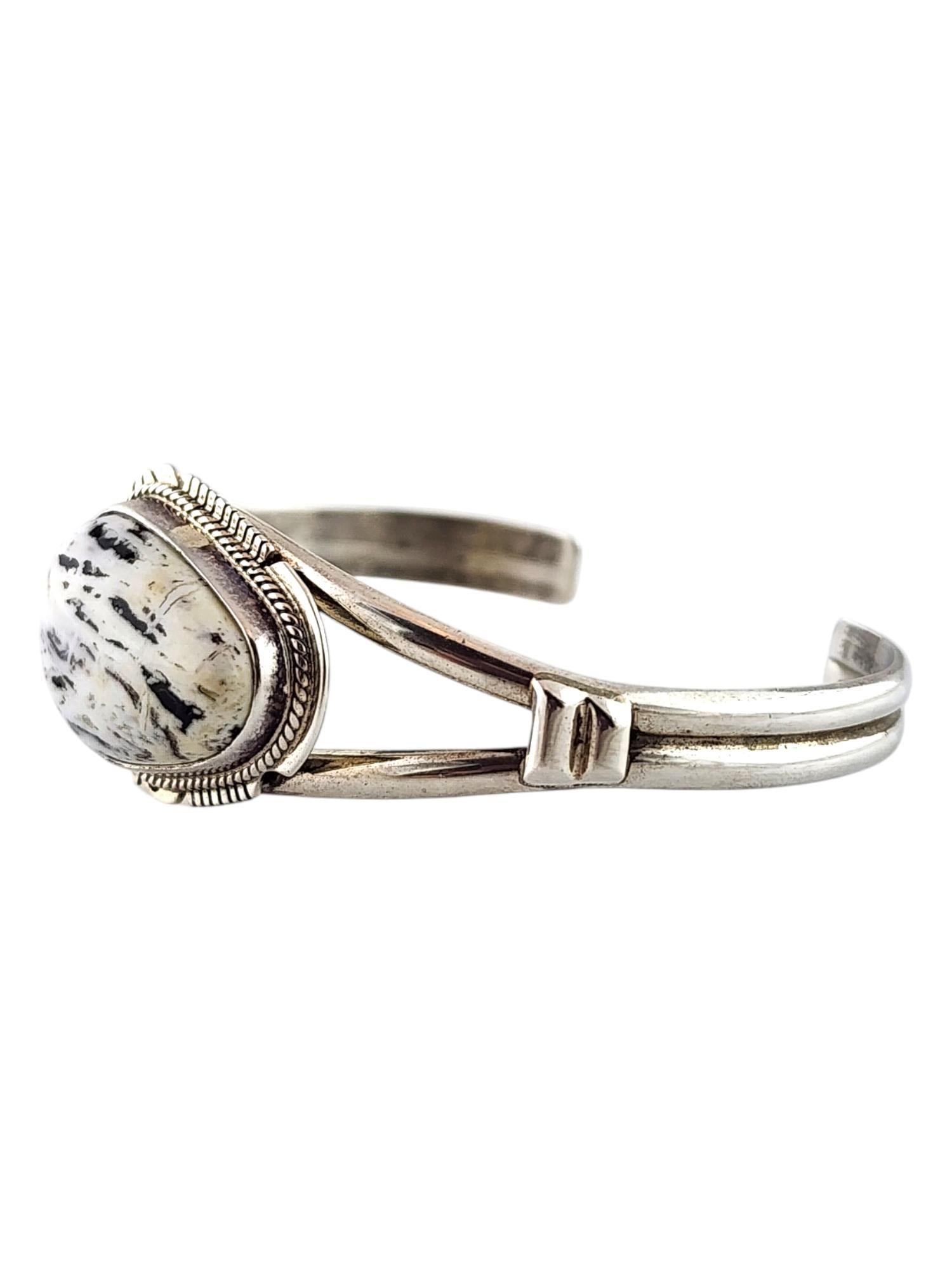 Sterling Silver Navajo Larson L. Lee White Buffalo Turquoise Cuff

This stunning Navajo cuff by Larson L. Lee was meticulously crafted from sterling silver with a beautiful white buffalo turquoise stone!

Size: 2 5/16