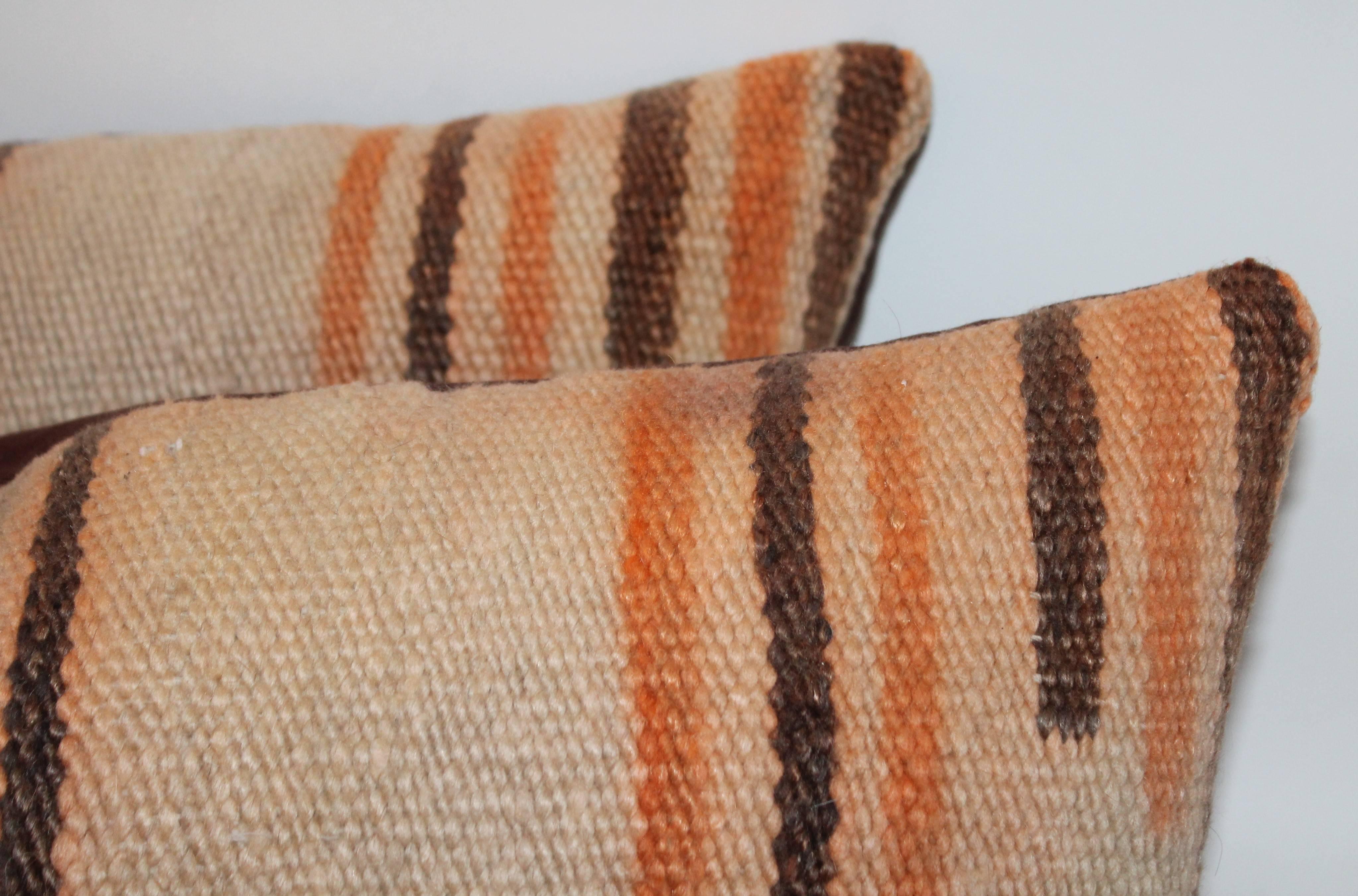 Early 20th Century Navajo Saddle Blanket Weaving Pillows, Pair For Sale