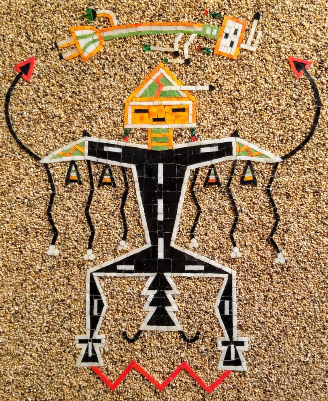 A Navajo sand painting mosaic art wall panel of the Navajo mythological Father Sky or Thunderbird created in the 1960s in a non traditional format from a studio in Tehachapi. California. 
The artist has created a boldly colored image isolated on a
