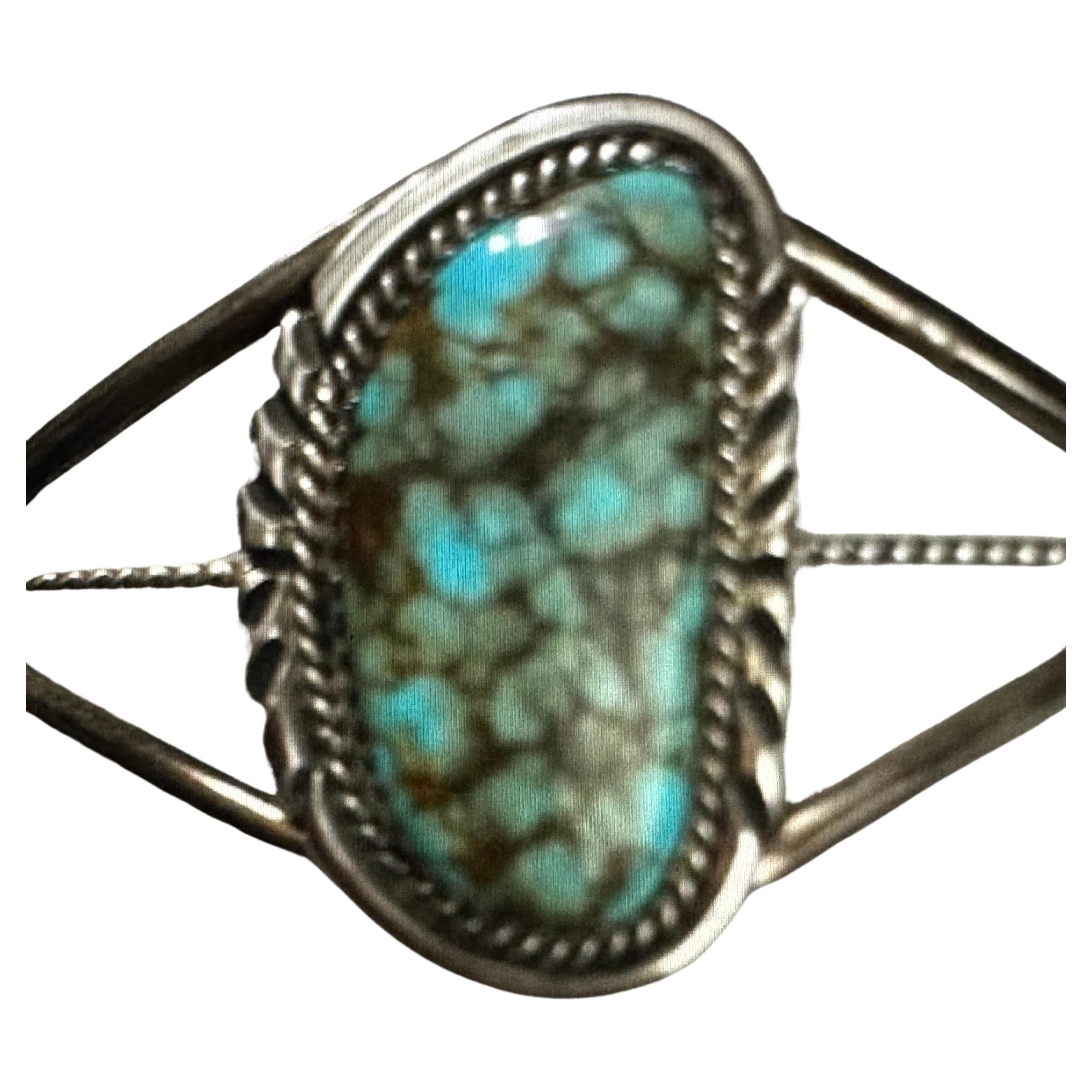 Sterling Silver .925  #8 Turquoise  Cuff Bracelet by Navajo Artist L Spencer
Measures approximately:
2 1/2