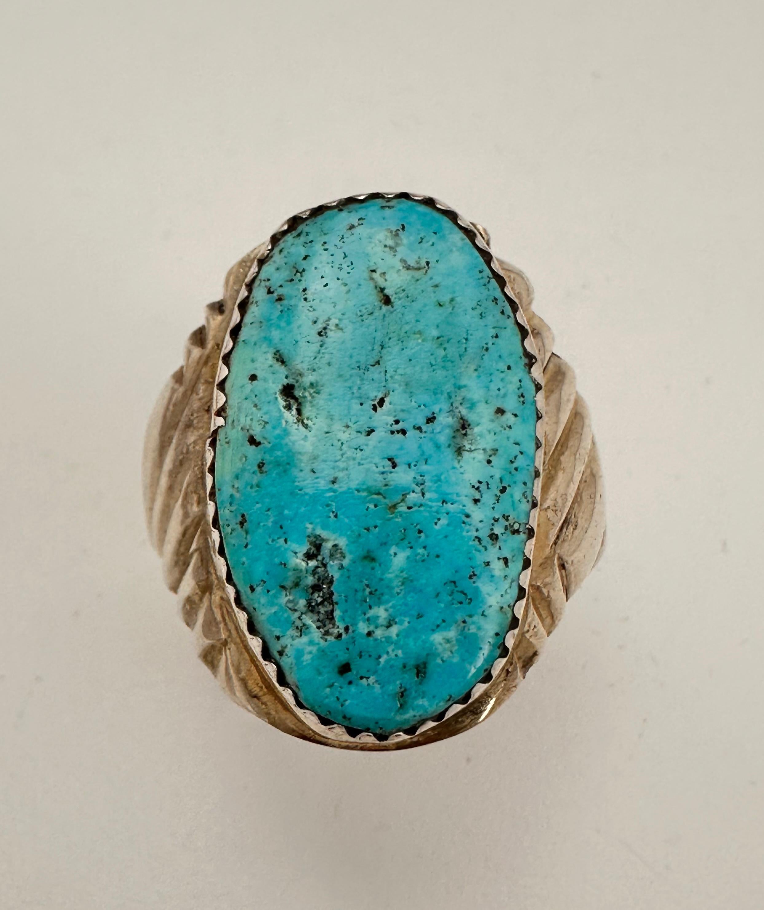 Navajo Sterling Silver .925 Kingman Turquiose 14mm x 25mm Oval Ring 
Size 10
Navajo artist Darren Chapo


Turquoise, a blend of the color blue and the color green, has some of the same cool and calming attributes. The color turquoise is associated