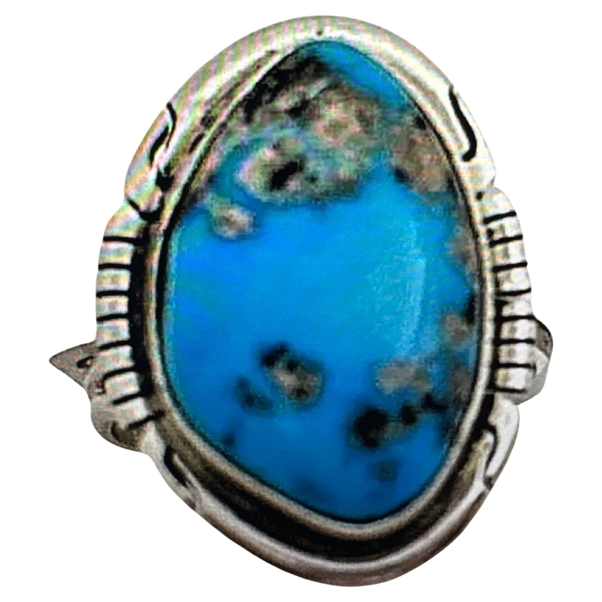 Navajo Sterling Silver .925 Kingman Turquoise 18mm x 25mm Oval Ring Size 8 3/4

Turquoise, a blend of the color blue and the color green, has some of the same cool and calming attributes. The color turquoise is associated with meanings of