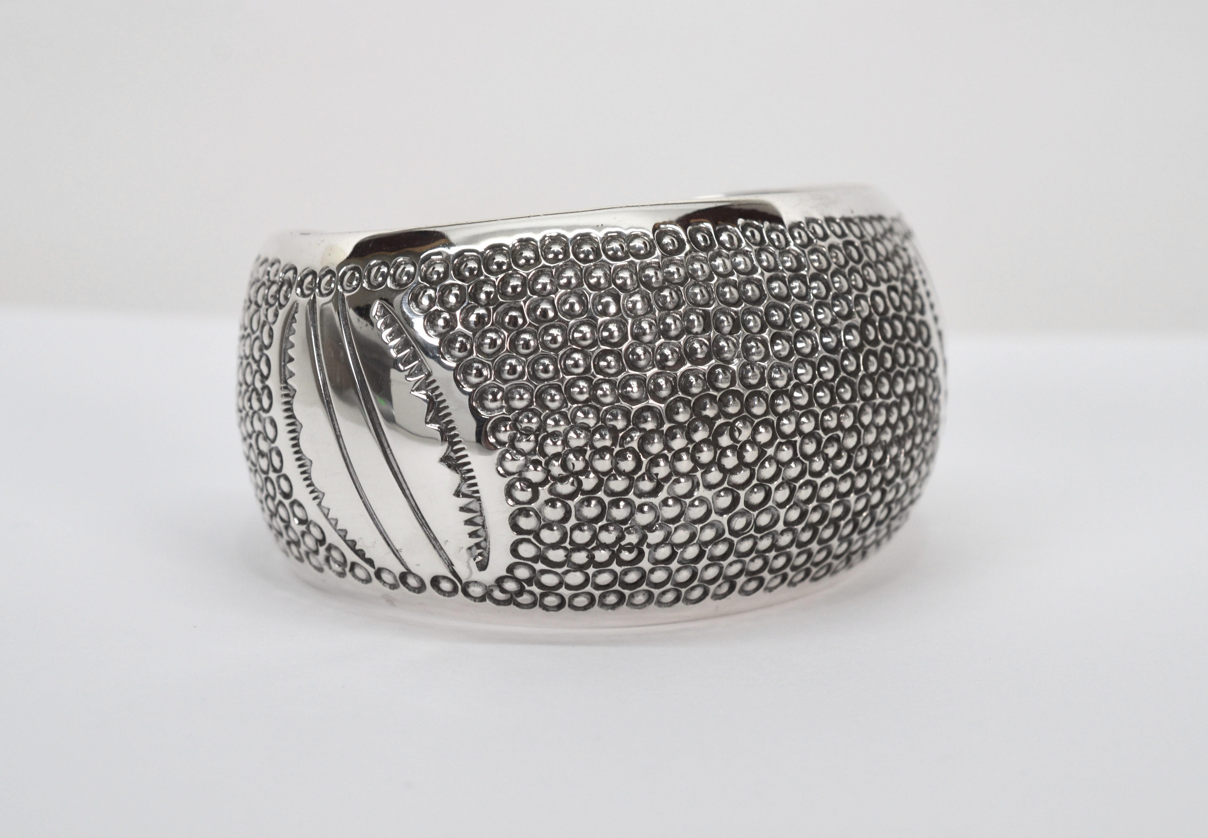 Timeless in sterling silver, this  Navajo cuff bracelet has a transitional design that is a complement to various styles and looks.  Impressive, this substantial hand polished domed cuff was created and signed by its known maker, Navajo master